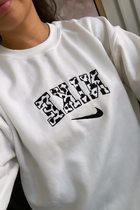 Nike cow print sweatshirt from Etsy 
Wearing the medium 