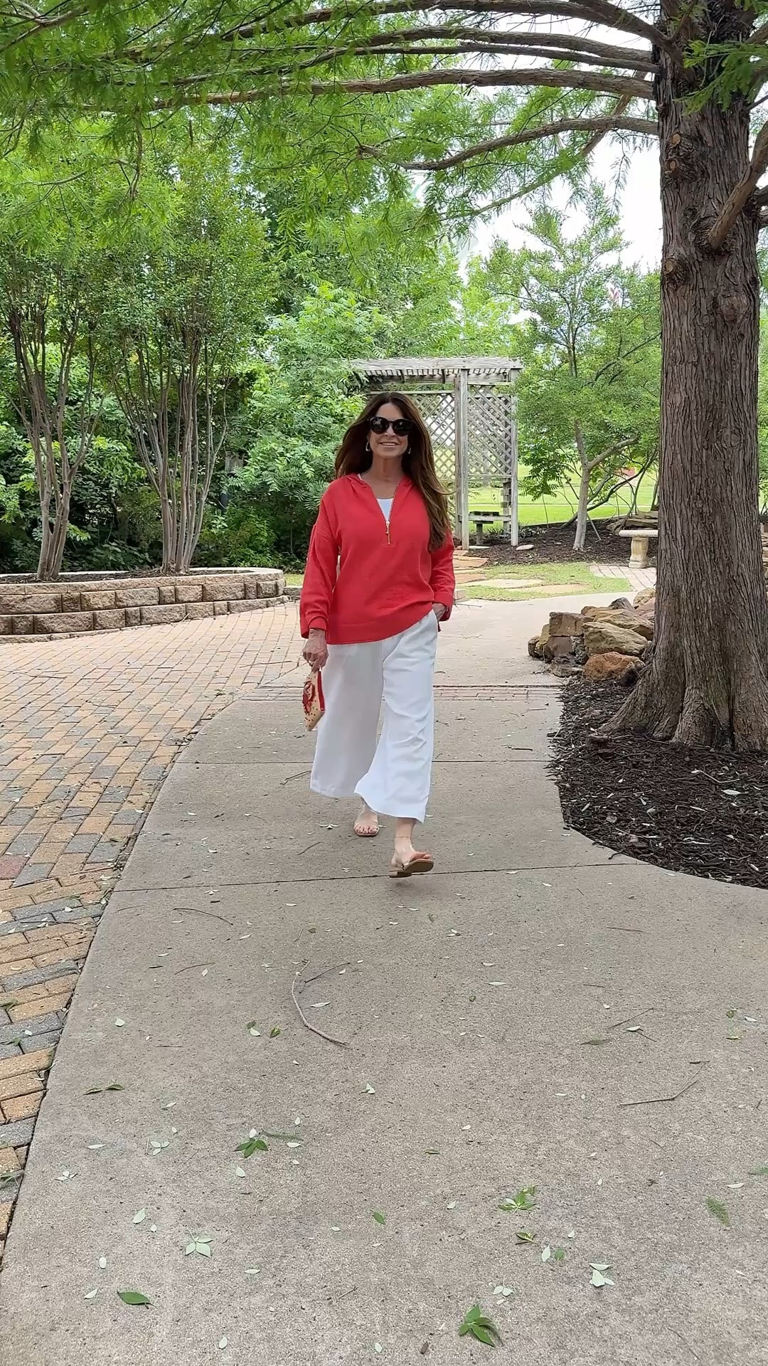 This casual and comfortable outfit is perfect for any outdoor activity, especially one that involves the beach. Lightweight gauze hoodie in red and blue. Perfect for the 4th of July too! White pull on cropped wide leg pants in a tencel material. So versatile to wear all summer long. Beaded wristlets with a crab and a shell are fun to hold essentials when going out for the day or night.

I’m 5’1” and about 110 lbs. wearing size petite XS tunics, petite XS white ribbed tank, petite Small pants for a slightly looser fit.