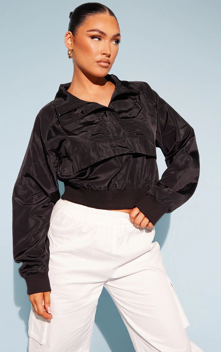 Black Cropped Elasticated Hem Shell Jacket | PrettyLittleThing US