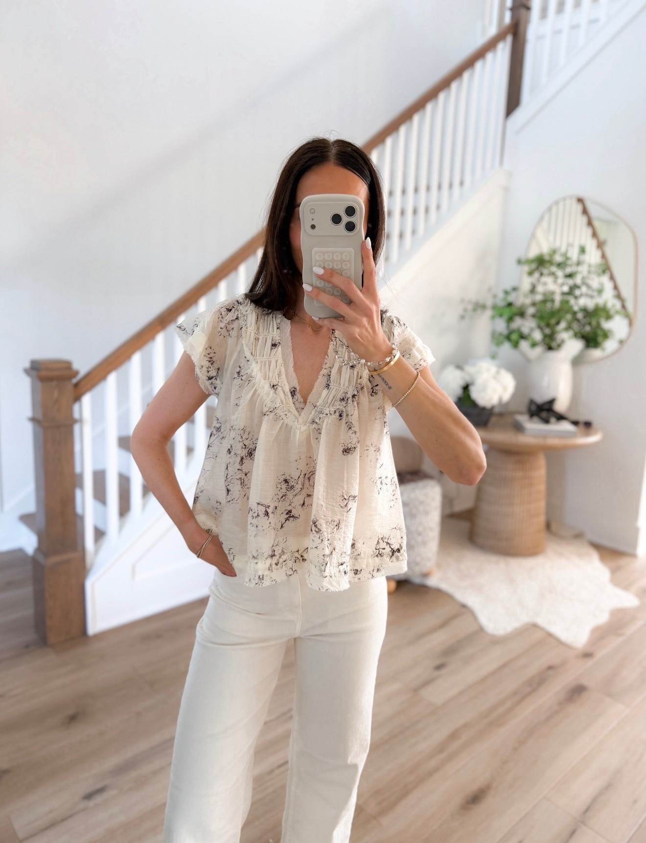 this top is so soft and feminine. the light, airy fabric and subtle print make it feel elevated but still really easy to wear. love the delicate details at the neckline, it gives it that extra something without needing much else. paired with white denim it’s the perfect clean, effortless combo

feminine top, lightweight blouse, white denim outfit, everyday style, soft neutrals, easy outfit, annabrstyle 

#LTKOver40 #LTKootd #LTKSeasonal