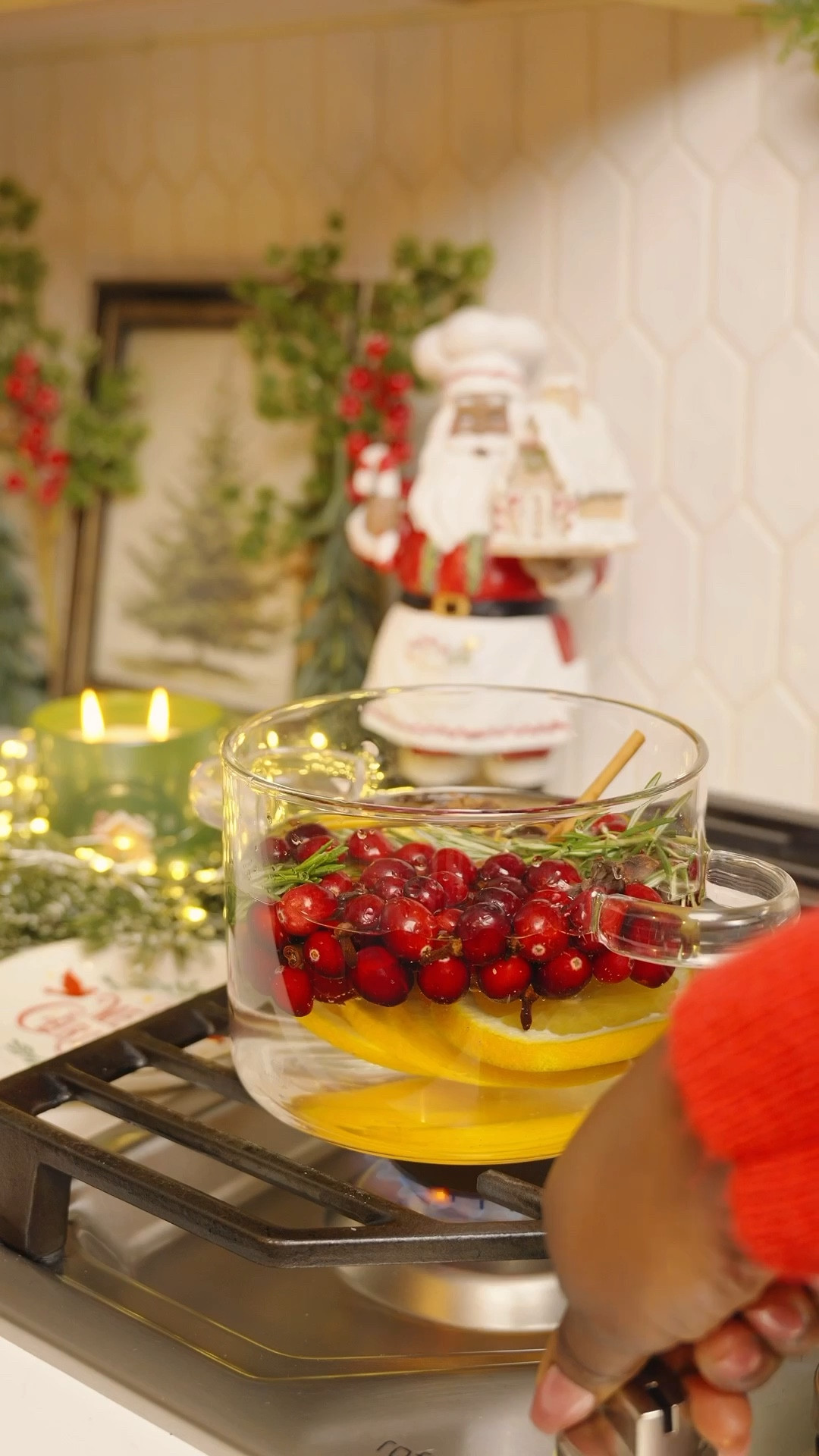 Hope everyone had a beautiful Thanksgiving. Now it’s officially time for Christmas vibes to roll in!
One of my favorite traditions is making this cozy Christmas simmer pot while decorating. It fills the whole house with the most comforting holiday scent. My family loves it and I hope yours will too.

Ingredients
• 1 Sliced of Orange
• 1 Cup of Cranberries
• 1 Teaspoon Whole Cloves 
• 2 to 4 Cinnamon Sticks 
• 1 to 3 Sprigs Fresh Rosemary 
• 4 to 5 Star Anise 

• Add everything to a pot and fill with 3 to 4 cups of water.
• Bring to a boil and let it simmer.

And Voila! 
Enjoy the smell of Christmas in your home.

#Christmaspotpourri #holidaypotpourri #traditions #christmasdecorations

#LTKCyberWeek #LTKHome #LTKHoliday