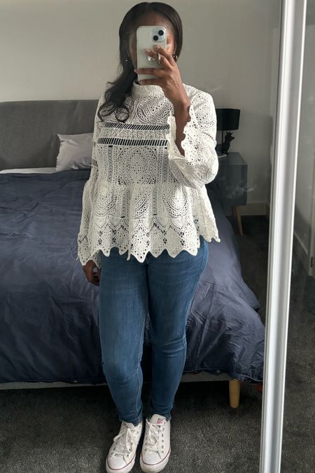 This easy lacy peplum top will bring life to any pair of jeans and sneakers | Struggling to put together adorable and effortless winter looks as a mom? Don't worry—I've got you covered with a plethora of charming choices to replicate this season. #StyleInspo #ltkfinds #WinterWardrobe✨
