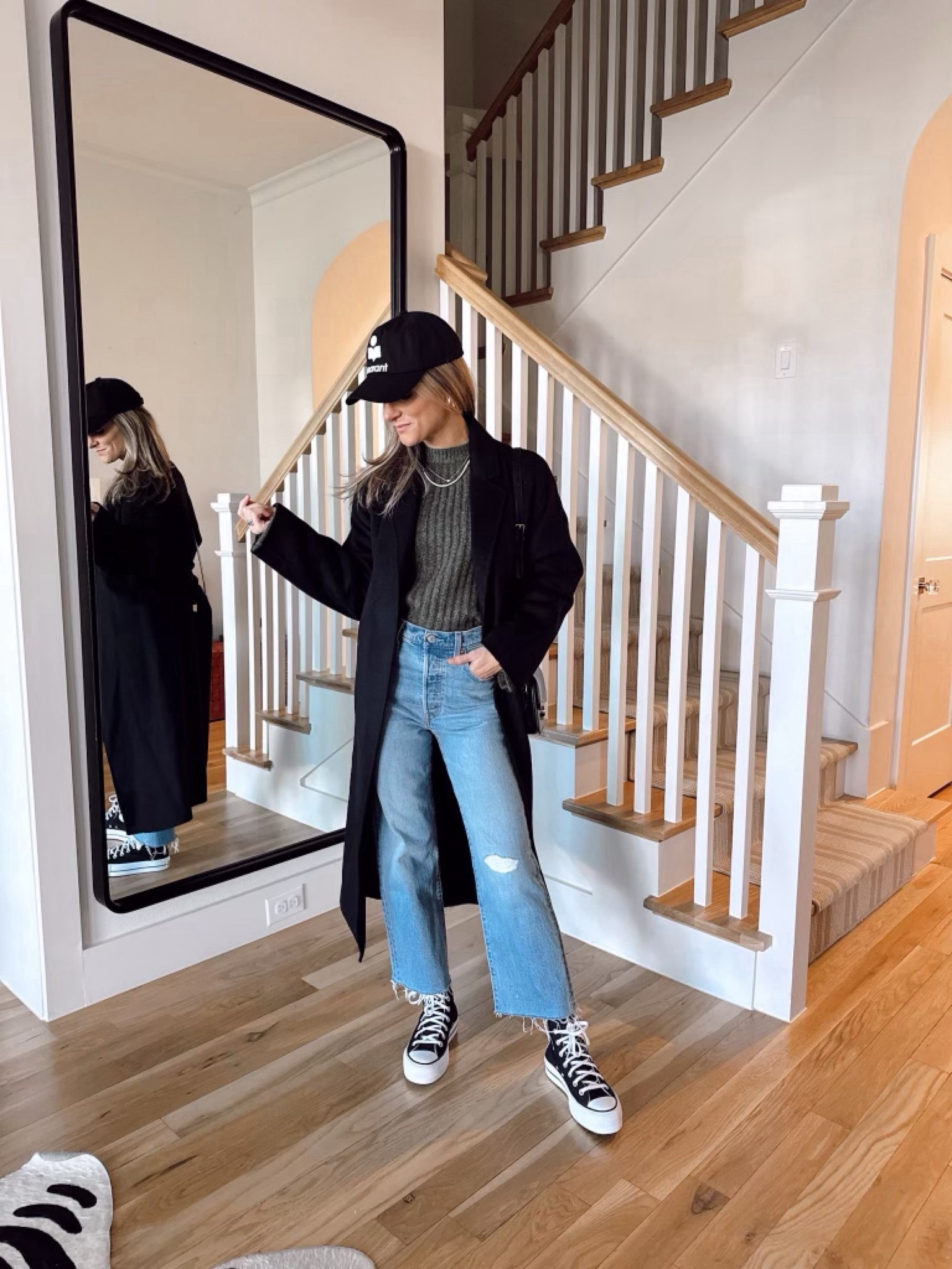 Wearing XS in sweater and coat 