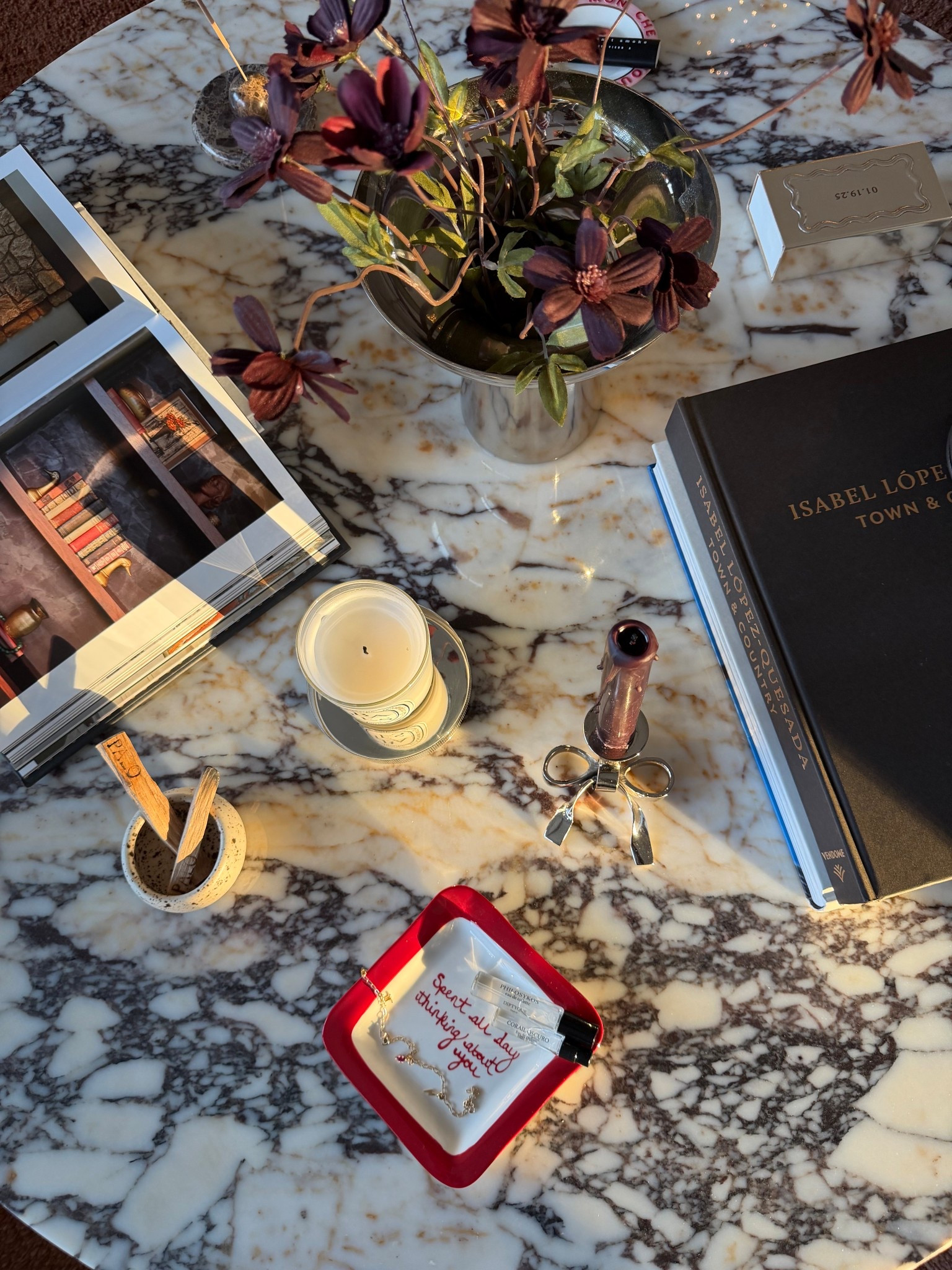 Calacutta Marble Coffee Table + all the coffee table styling that goes with it! Loving the silver accents, coffee table books, and trinket dishes 

#LTKHoliday #LTKGiftGuide #LTKHome