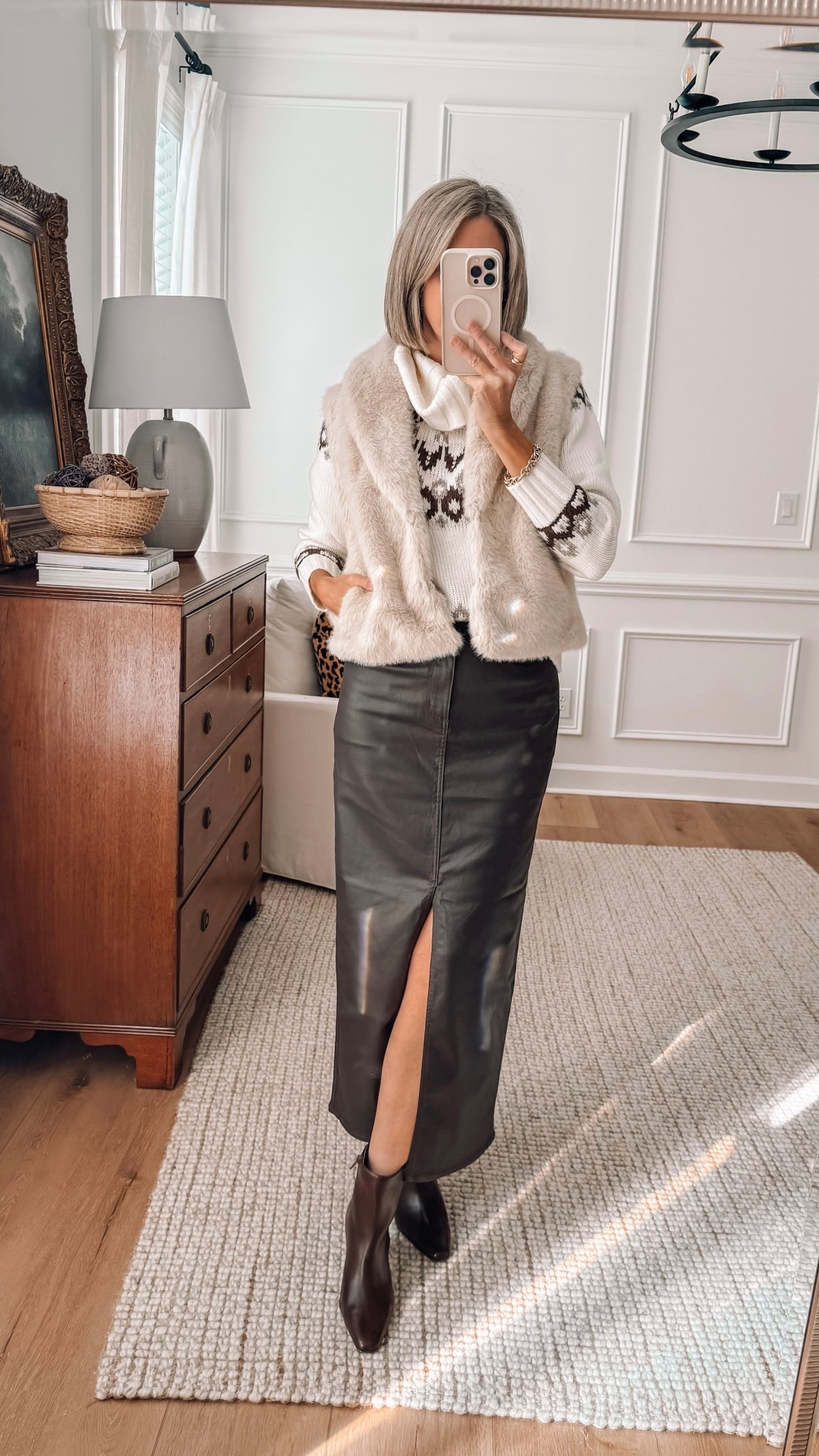 Thanksgiving outfit idea that’s dressy but still comfortable enough for a full dinner 🦃✨
The faux-fur vest adds warmth, the fair isle sweater keeps it festive, and the skirt/boot pairing makes it feel elevated. Wearing XS in sweater and vest size 2 in the faux leather skirt 


#LTKSaleAlert #LTKHoliday #LTKFindsUnder50
