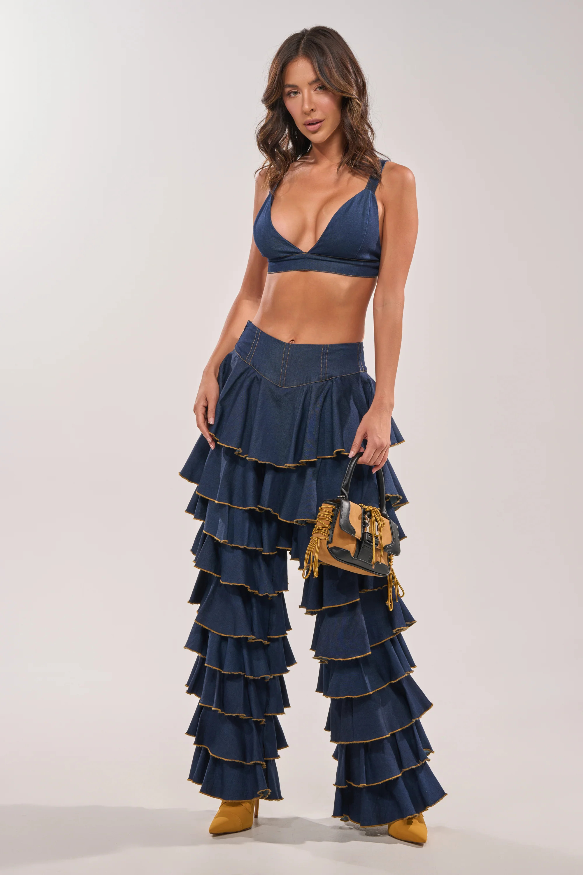 SHAKE IT OUT DENIM RUFFLE JEANS | AKIRA