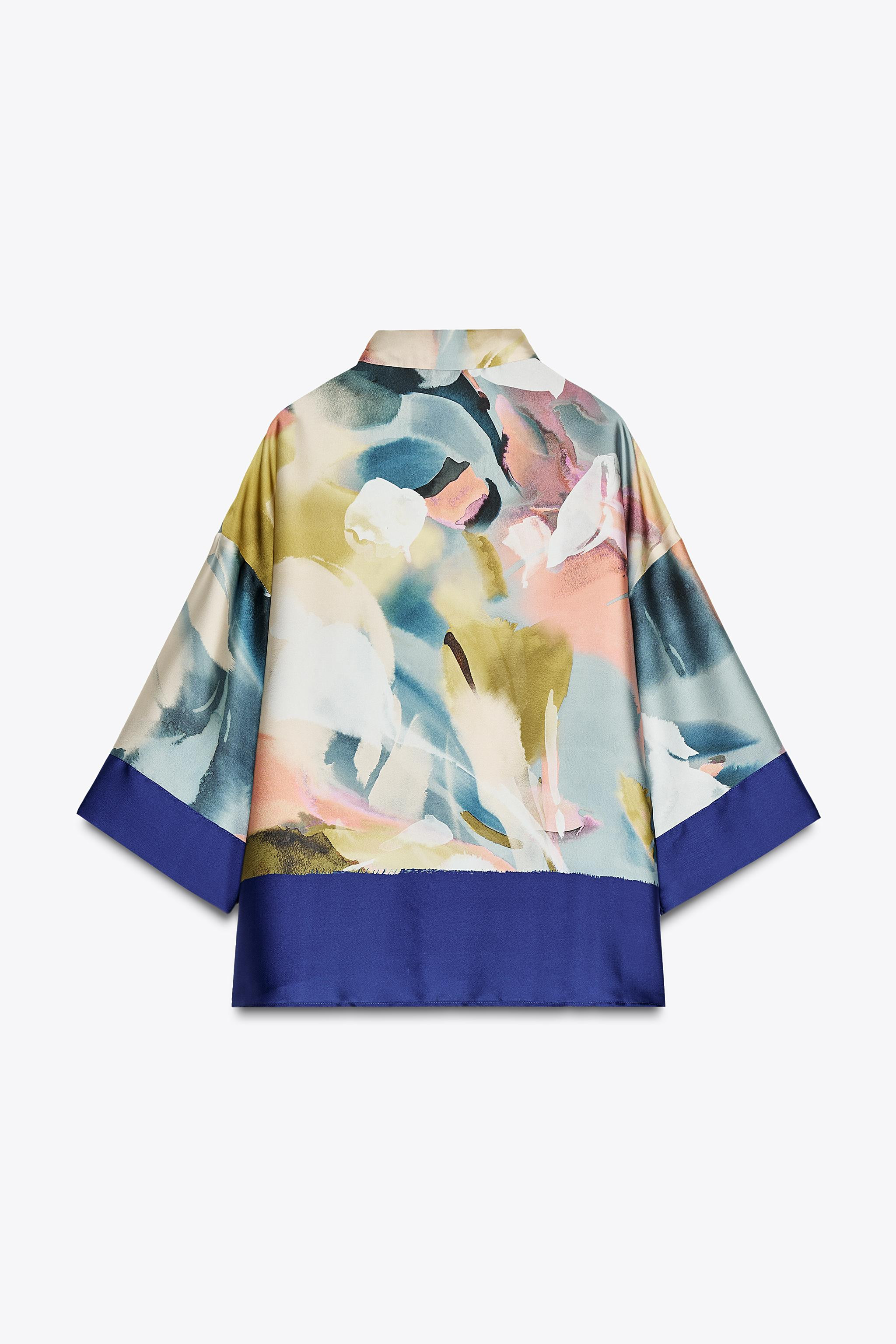 Lapel collar shirt with wide, below-the-elbow sleeves. Front button closure. | Zara US