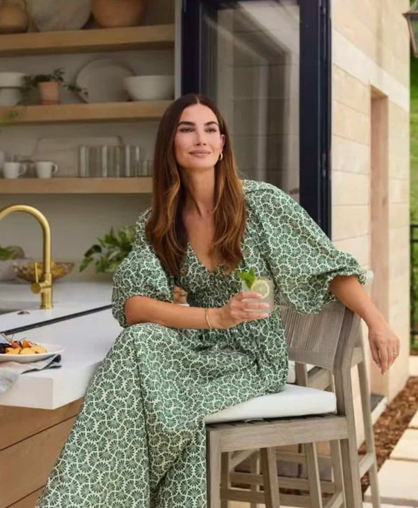 Lily Aldridge green and white
smocked floral-print dress
