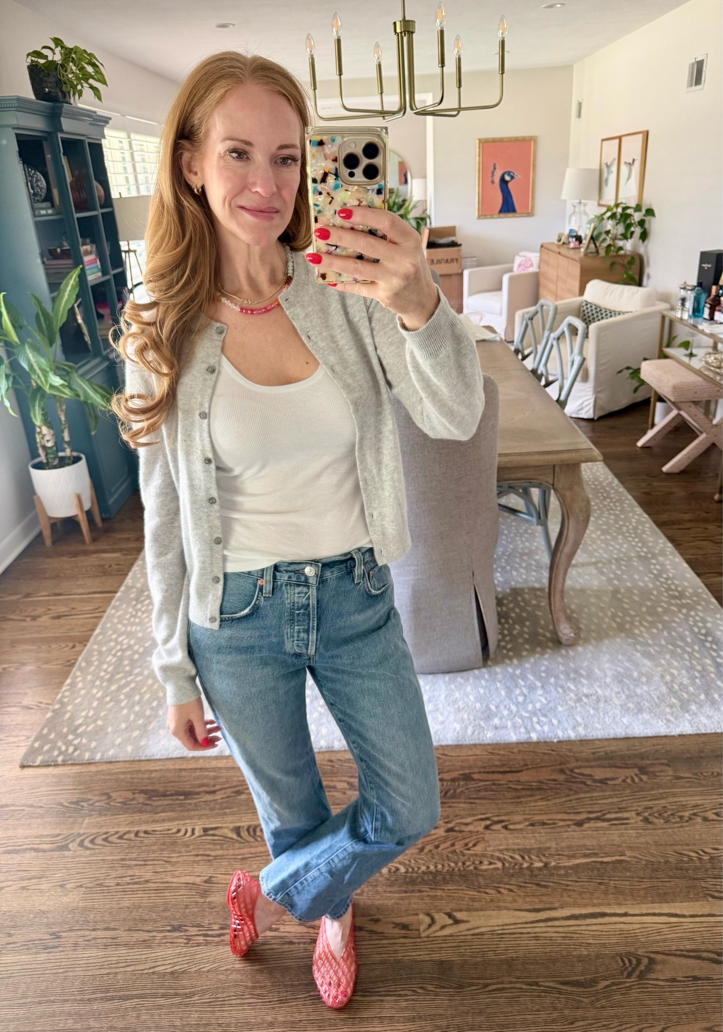 This is what elevated everyday looks like. Good jeans and a cashmere cardigan paired with a basic white tank and Amazon jelly flats.

#LTKootd #LTKOver40 #LTKdayinmylife