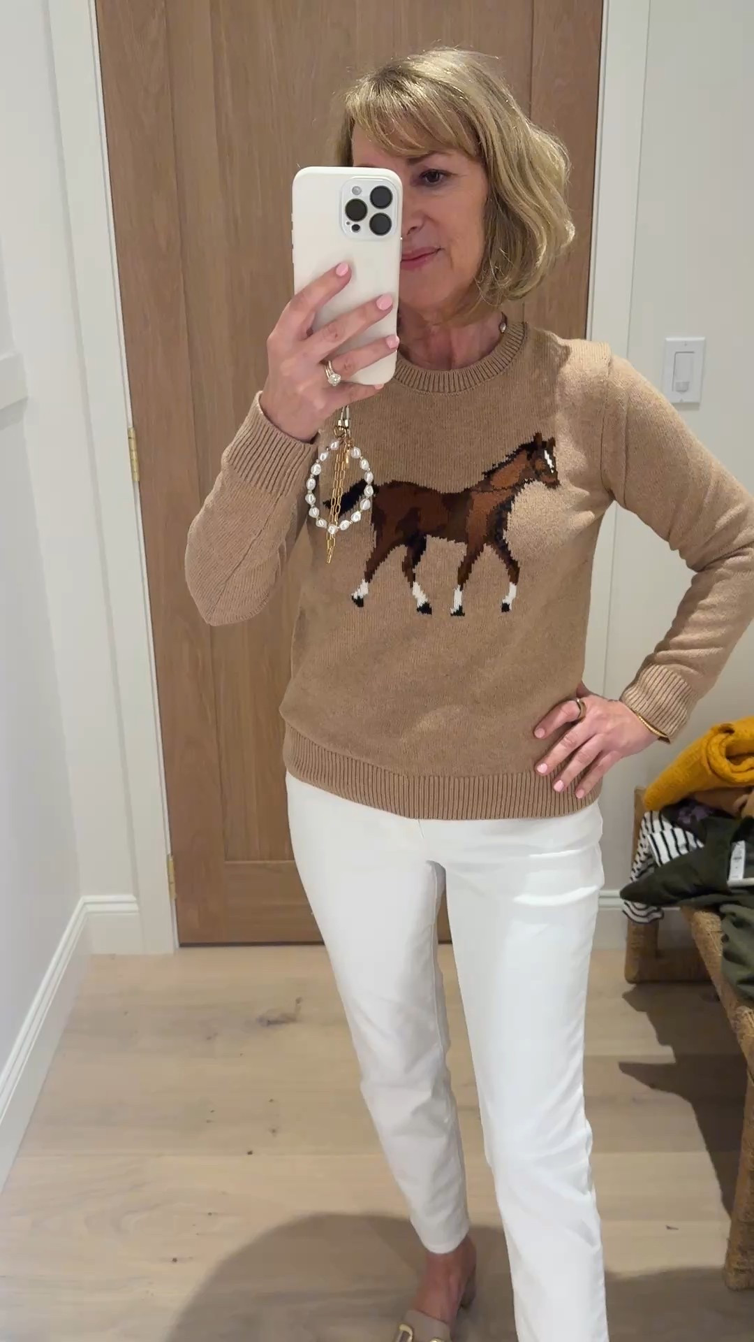 Horses are trending and this sweater is a must have for fall. 25% off today. White
Jeans on sale too. 

#LTKSaleAlert #LTKSeasonal #LTKOver40