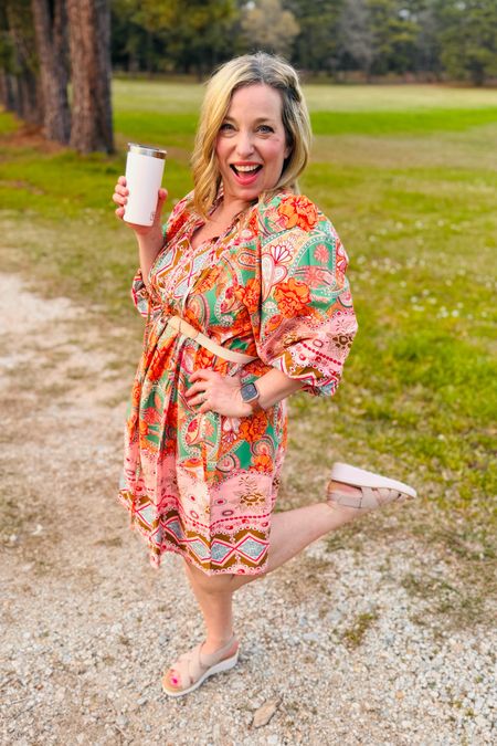 This flirty dress looks so cute belted! Pair with wedges! Awesome travel outfit, resort wear look or cruise outfit! 

#LTKfindsunder50 #LTKover40 #LTKtravel
