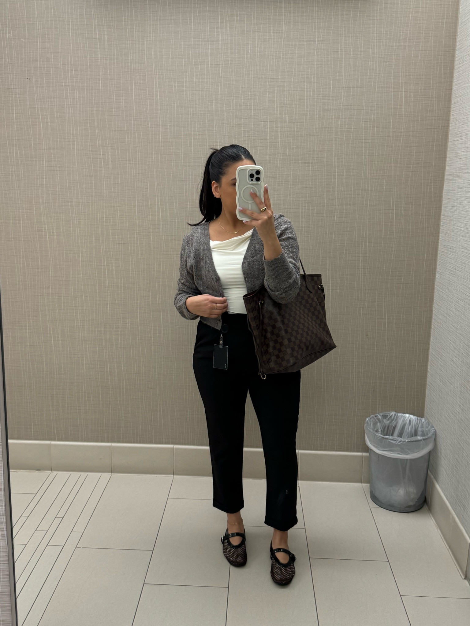 Workwear outfit idea business casual 
Ruched top: small
Cardigan: xs
Black paper bag pants: small
Mesh ballet flats: 6.5 
Lv neverfull tote bag 

#LTKStyleTip #LTKWorkwear #LTKSeasonal
