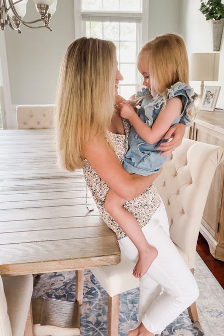Mommy and me summer outfit - love this breezy top for those hot summer days - wearing an XS top, size 2 jeans - toddler girl’s denim romper - dining table, chairs and sideboard