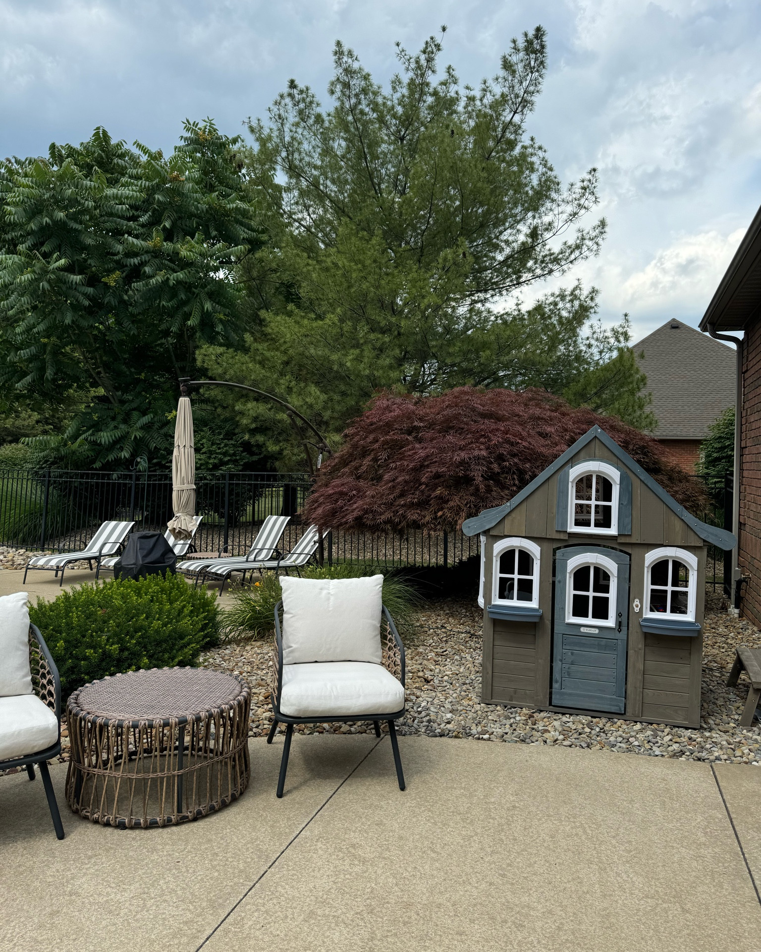 Outdoor patio furniture. Toddler playhouse. Outdoor playhouse. KidKraft outdoor play house. Pool chairs. Outdoor furniture. Outdoor decor. Outdoor kids house. 

#LTKHome #LTKFamily