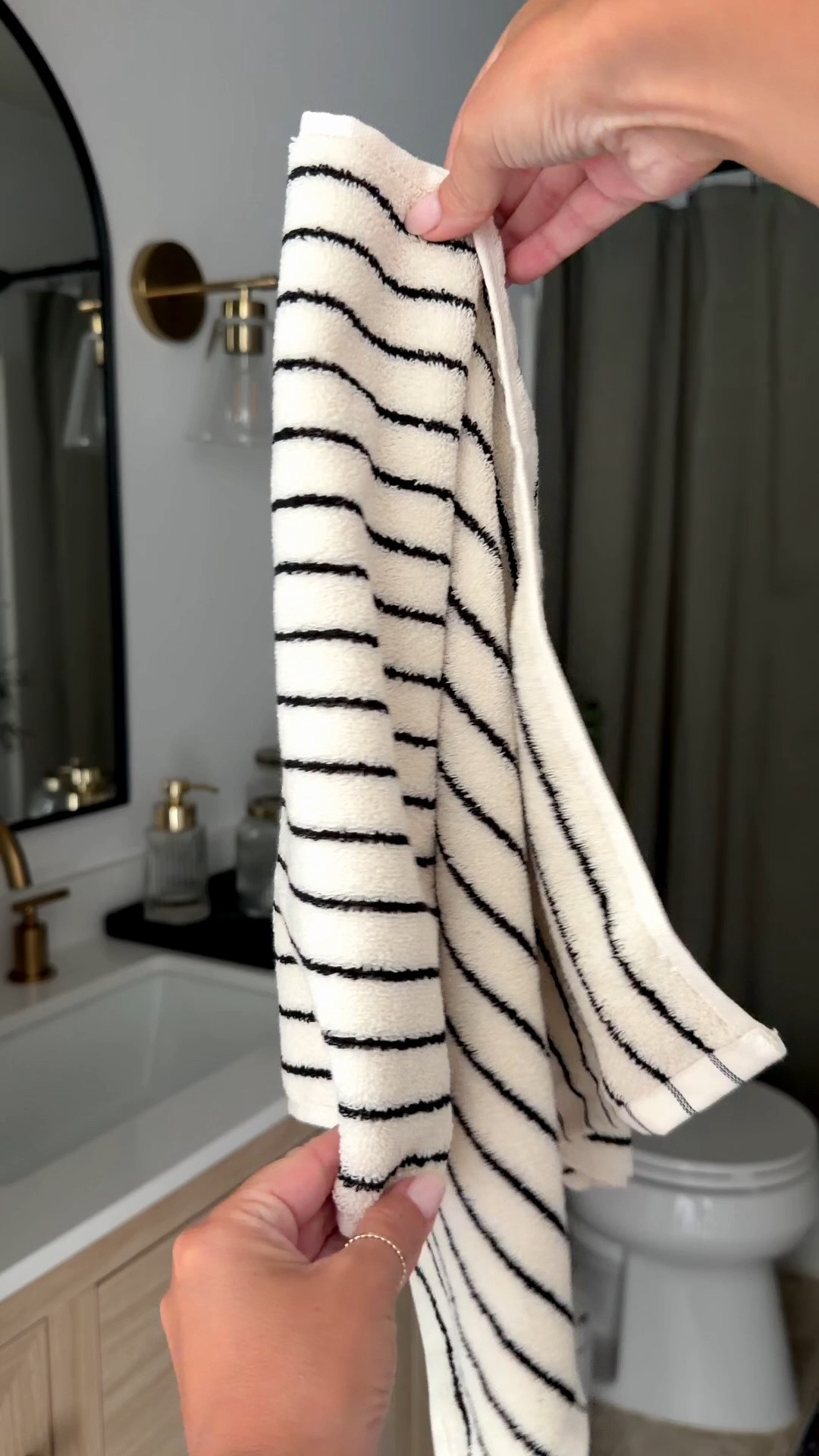 These striped hand towels are such an easy way to give your bathroom a fresh, elevated look 🤍 Soft, neutral, and that effortless designer-inspired detail I love!

#bathroomdecor #bathroominspo #handtowels #neutralhome #homedecor #homefinds #affordablehomedecor #designerinspired #ltkhome #ltkfinds

#LTKSeasonal #LTKSaleAlert #LTKHome