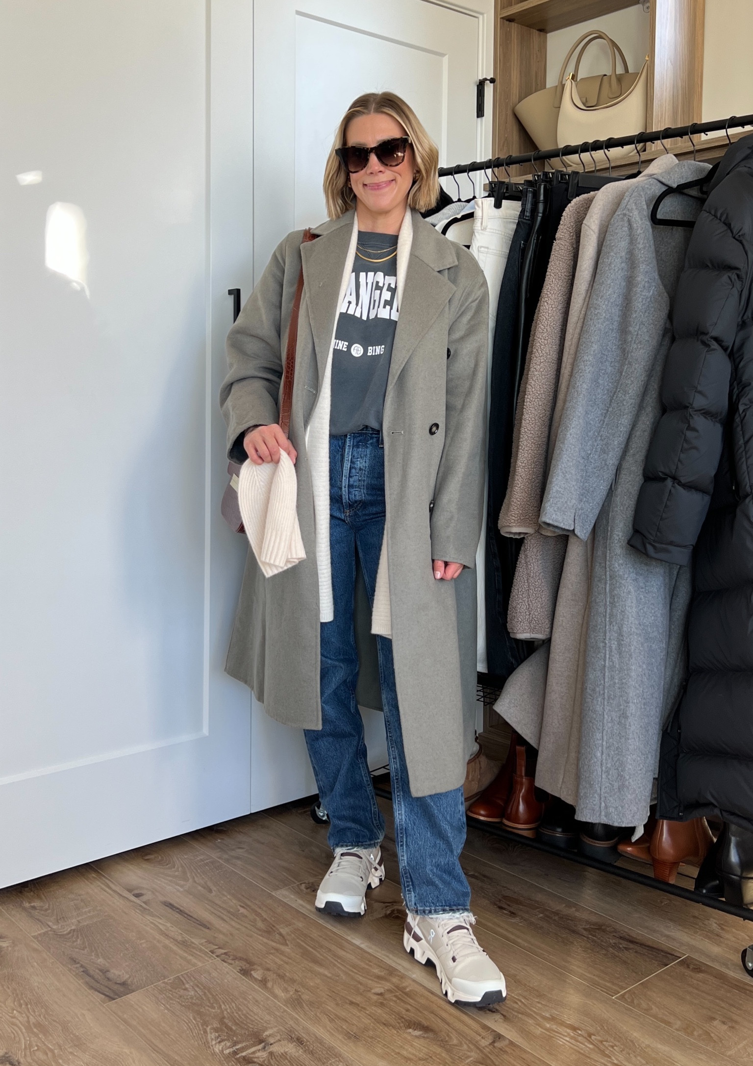Wearing large graphic sweatshirt (sized up), 25 jeans (sized down), small wool coat, sneakers tts

#LTKfindsunder50 #LTKfindsunder100 #LTKSeasonal