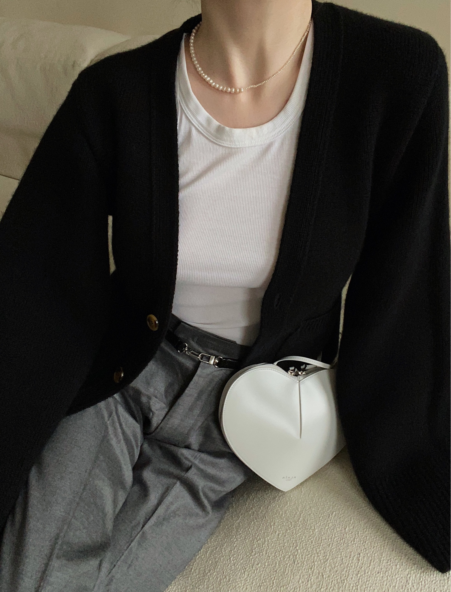 Timelessness 

Maison Alaïa bag, Khaite cardigan, Toteme belt 

#LTKworkwear #LTKitbag #LTKSeasonal