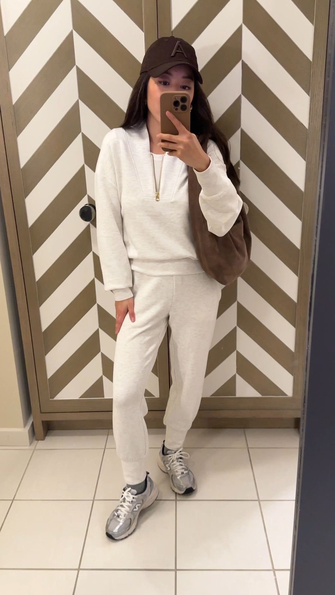 Petite friendly, Laid back winter outfit with elevated sweats set. This was a little splurge last year but def lived up to my expectations. So soft and doesn’t stretch out with all day wear, and looks good for wearing out of the house. 

• Varley The Slim Cuff Joggers in ivory marl xxs. 25” is very petite friendly on me. You can get the longer 27”  length (in a separate product listing on Varley site) if you are taller and don’t want a cropped style.

• Varley Davidson woven sweatshirt in ivory marl xxs. Double soft material is the best and worth it IMO!

• Aritzia slouch coat xxs short (petite) - very warm, runs big with an oversized fit. Linked a color stocked in petites!

• Quince cashmere socks 

• Etsy suede hobo bag in Corteccia color, medium size . Perfect slouch, very comfy over the shoulder. Use JEANHOBOBAG30 

• Aritzia baseball cap 

• New Balance 530s - I have the kids version size 3.5, can also fit women’s 5

Casual Athleisure outfits, petite friendly winter outfits, errands 

#LTKSeasonal #LTKPetite #LTKTravel