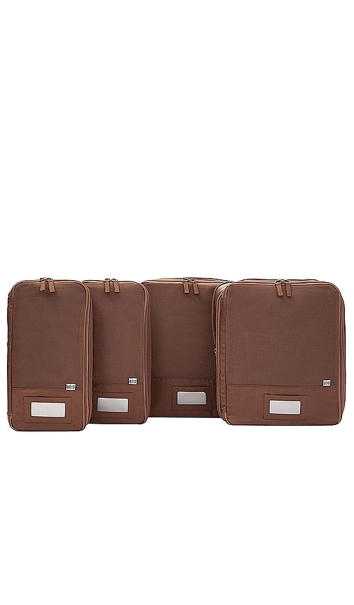BEIS The Compression Packing Cubes 4pc in Brown. | Revolve Clothing (Global)