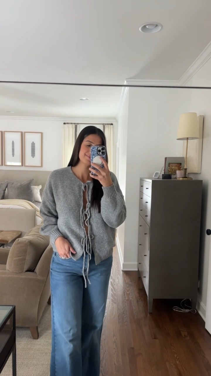 Such a great open face bow cardigan sweater option for winter! Comes in a TON of different colors.✨ TTS M 

cardigan sweater, winter outfit, cardigan sweater, bow sweater, jeans, denim, backless bra, relaxed jeans, winter outfits, neutral sweater, a Southern Drawl, Grace White 

 #LTKFindsUnder50 #LTKFindsUnder100 #LTKStyleTip