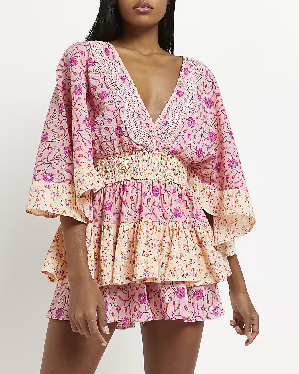Pink mixed floral playsuit | River Island (UK & IE)