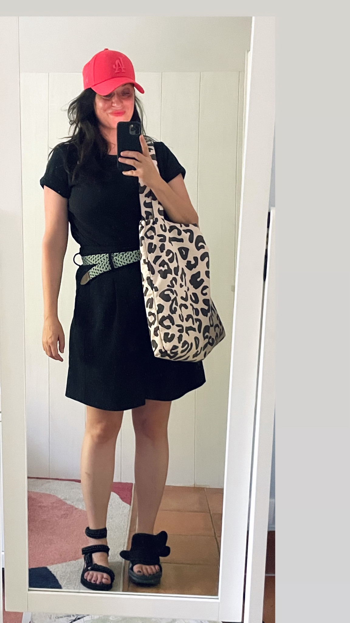 * Coral L.A. Dodgers baseballl cap #newera (linked)
* Black t-shirt #uniqloU by #christophelemaire (similar, linked)
* High waist black pinstripe short #zara
* Mint green braided belt #BCBGMaxAzria
* Leopard puffy bag #studionoos 
* Ankle trek sandals #arizonalove (linked)

#LTKsummer #LTKmidsize #LTKfrance