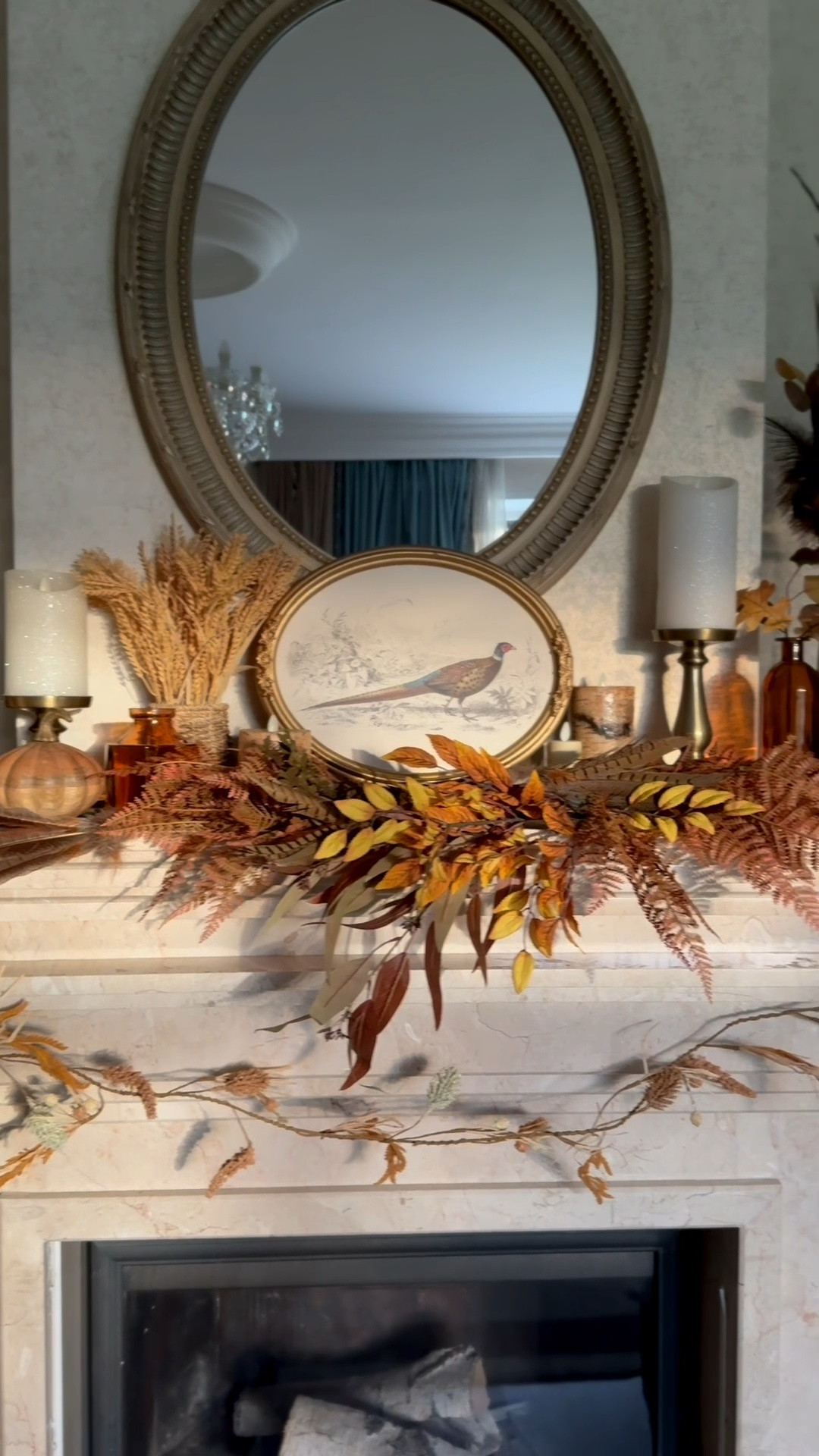 Fall living room mantel decor, @Michaels faux floral stems, pumpkin battery operated candle, traditional home decor

#LTKHome #LTKSeasonal #LTKSaleAlert