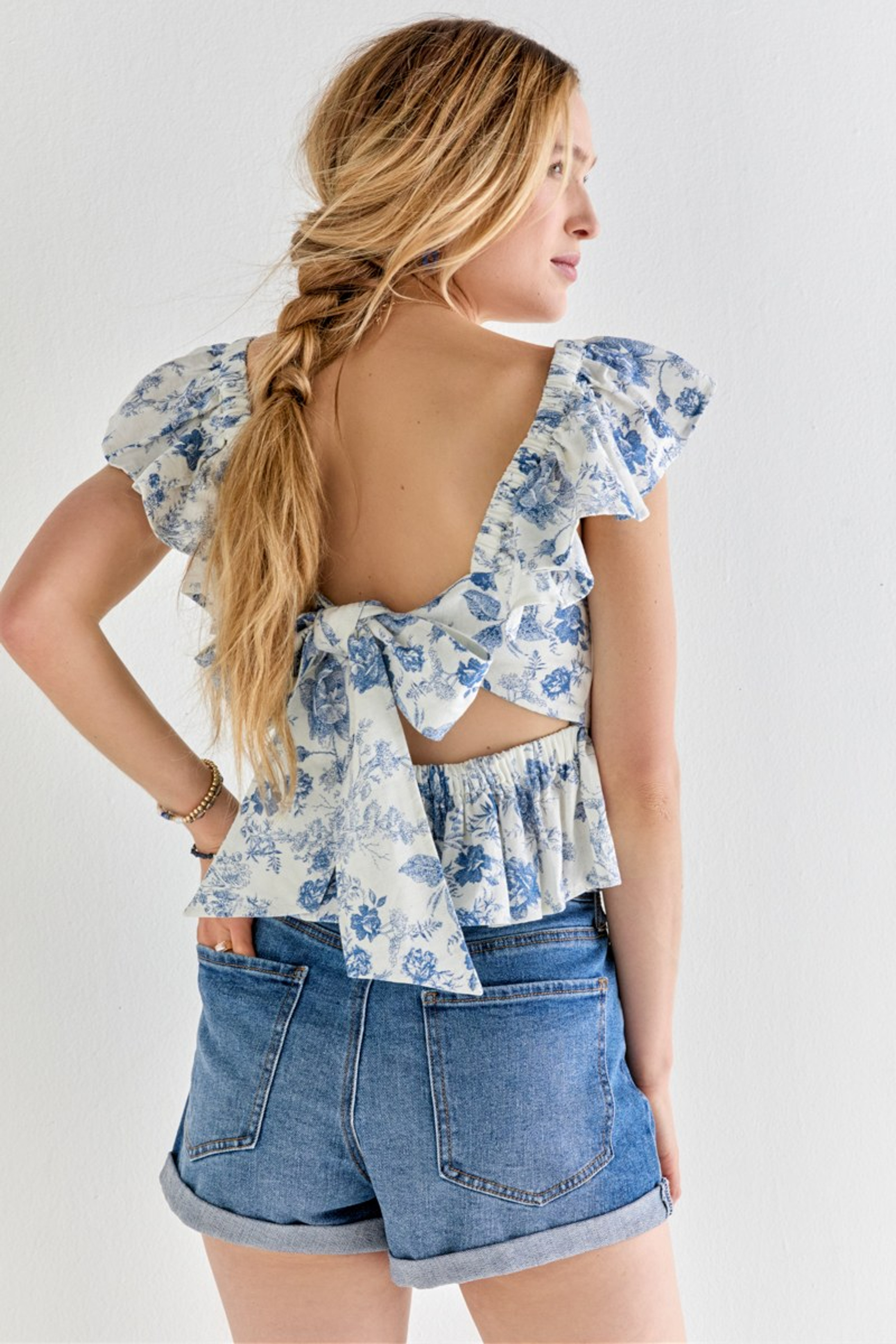 Bella Floral Flutter Sleeve Bow Back Top | Francesca's