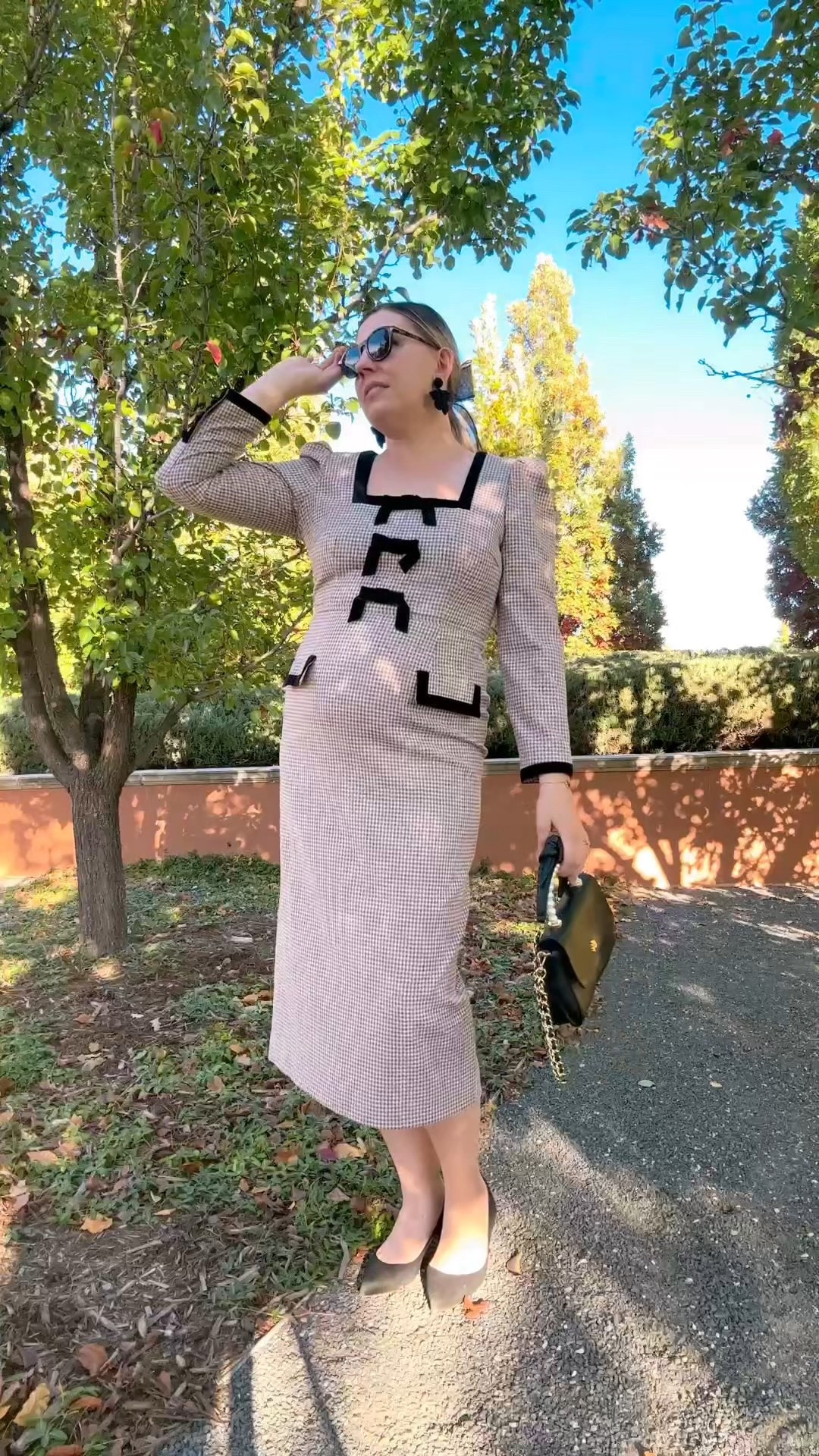 Look 13 - The Coco Cabana ☕️ 
A curated style series 

One of my favorite things about fall is the air of romance - that feeling that something magical could happen at any moment. ✨ This look really brings that to life for me - it’s quite practical in function, yet it makes me feel like I’ve stepped straight out of a novel or a film which is my favorite way to dress.

As the Coco Cabana capsule comes to a close, I can’t thank you enough for following along. This series has been all about channeling a Palm Beach-meets-Park Avenue vibe for fall and it has been a true delight to wear all of these looks as of late. Stay tuned for the next theme launching tomorrow…. 👀 

My capsules are designed to tell a story - blending new, thrifted, and rental pieces into mini seasonal wardrobes. And next week, a whole new story begins… 

You can also head over to my LTK to shop all of my Coco Cabana looks and pieces featured throughout this capsule - plus a few extras that fit right in with the theme. 💕

Dress - Dillards 
Bag - Lele Sadoughi (linked)
Shoes - Jimmy Choo (linked)
Sunglasses - Tom Ford (linked)
Earrings - Oscar de la Renta (linked)
Hair Bow - We Wore What
Bracelet - Rocksbox 
Rings - Kate Spade

#LTKSeasonal #LTKTall #LTKHoliday