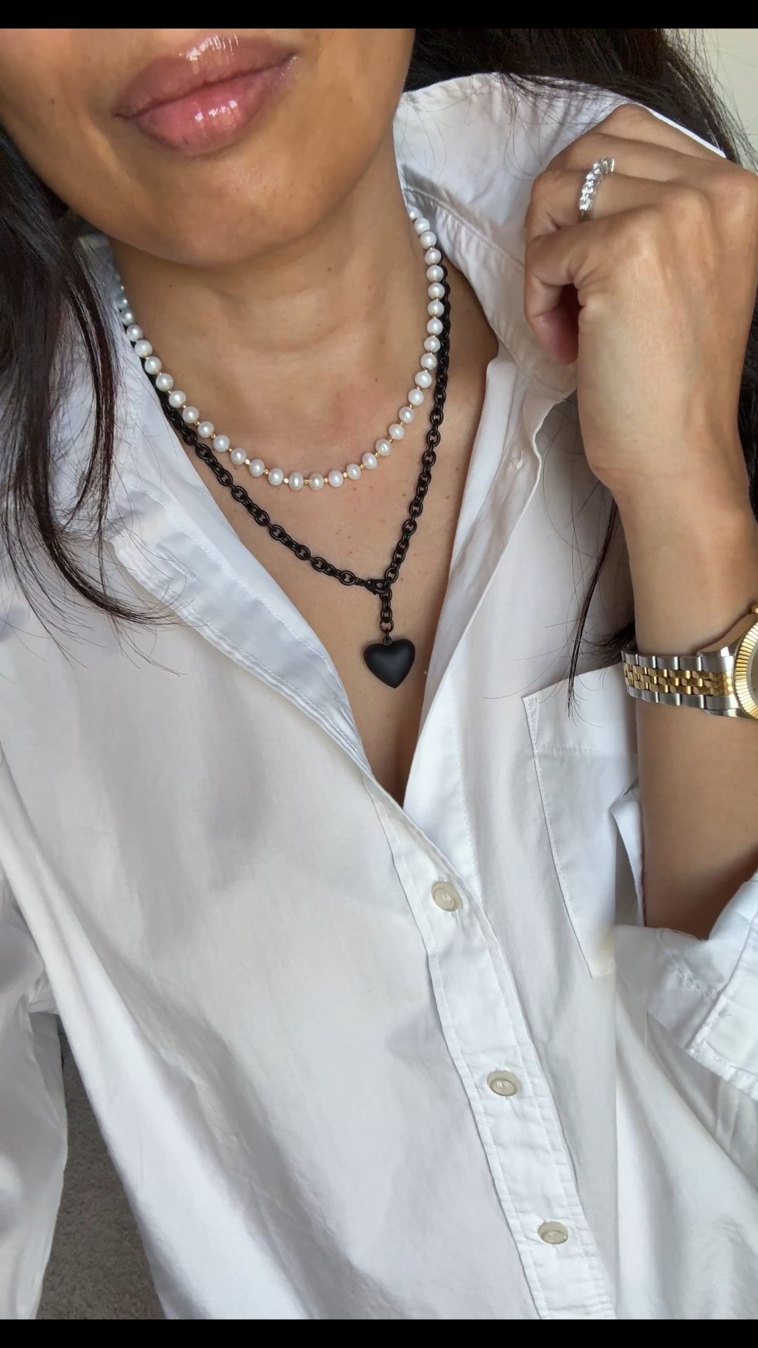 New necklace styled 4 ways  
I love the edgy chic look to this matte black heart necklace. Especially against a white top. 
Pairs well with:
-silver (necklace shown is the same style)
-gold (charm necklace shown is my most worn lately)
-pearls (for a more feminine vibe. Code Naomi20 to save)
-bling (to dress up for evening)
Exact button down is all cotton in an oversized style. True to size. Also linking the classic fit version. 
Favorite lip oil in shade pointelle. 


#LTKStyleTip #LTKOver40 #LTKFindsUnder100