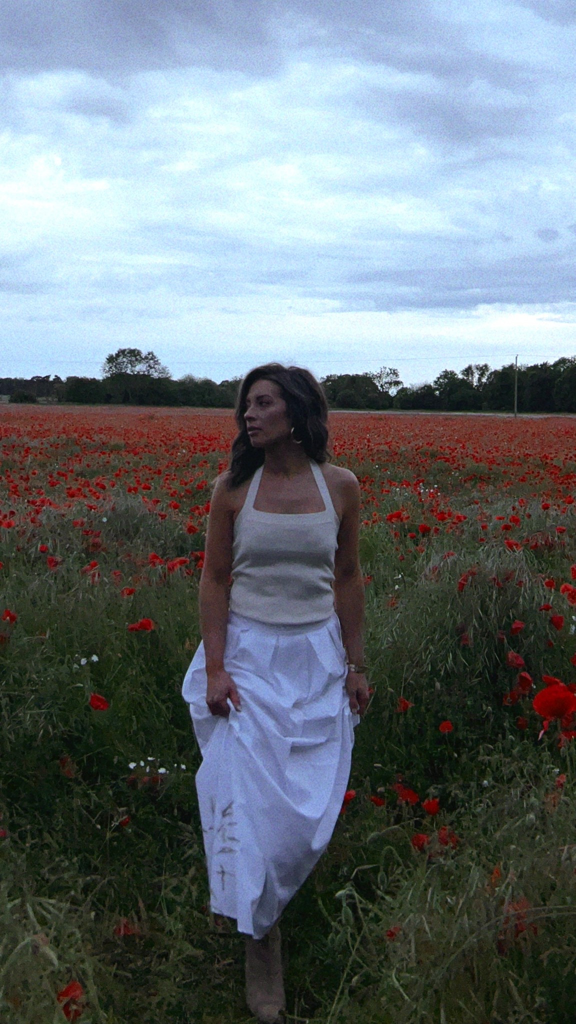 Summer nights. England countryside. Poppy fields. Photoshoot outfit idea. Monochromatic outfit. White maxi skirt. Knitted halter tank top. Summer outfit. European summer. Outfit idea. Summer style. Pretty Little Think skirt. Suede western boots. Casual summer outfit idea.

#LTKFindsUnder100 #LTKSummerEdit #LTKFindsUnder50
