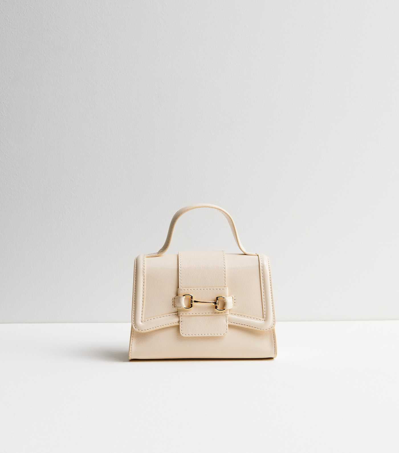 Cream Patent Snaffle Cross Body Bag
						
						Add to Saved Items
						Remove from Saved Items | New Look (UK)