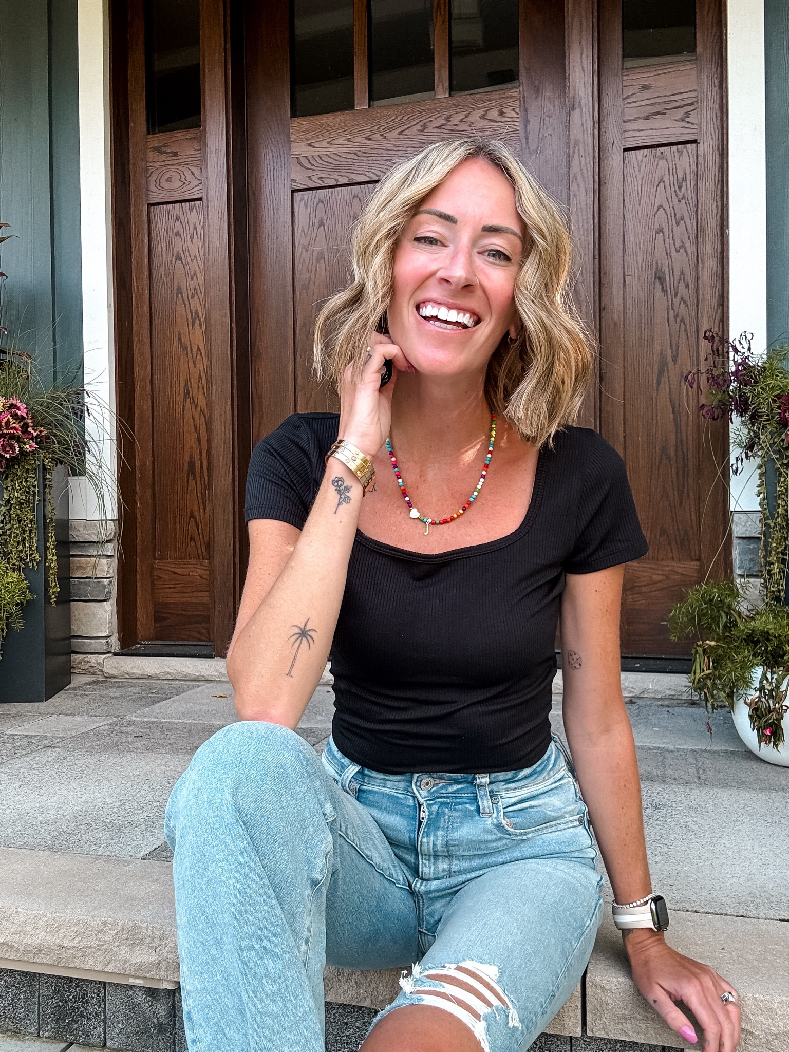 The best ever basic black square neck top - looks great with flare jeans and other denim
This is my go to outfit right now 
Seamless cropped top and initial necklace is under $10  