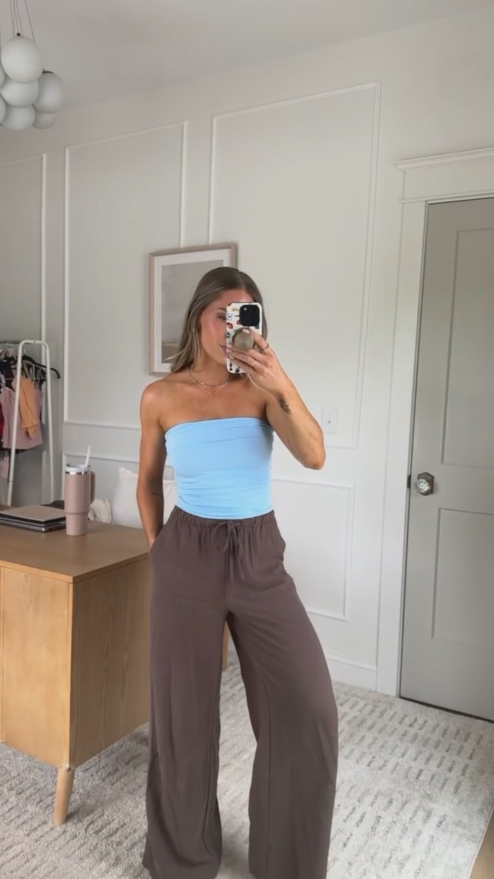 OBSESSED with this color combo 🩵🤎

wearing an XS in both 

tube top
linen pants 
vacation outfit 

#LTKActive #LTKFindsUnder50 #LTKTravel