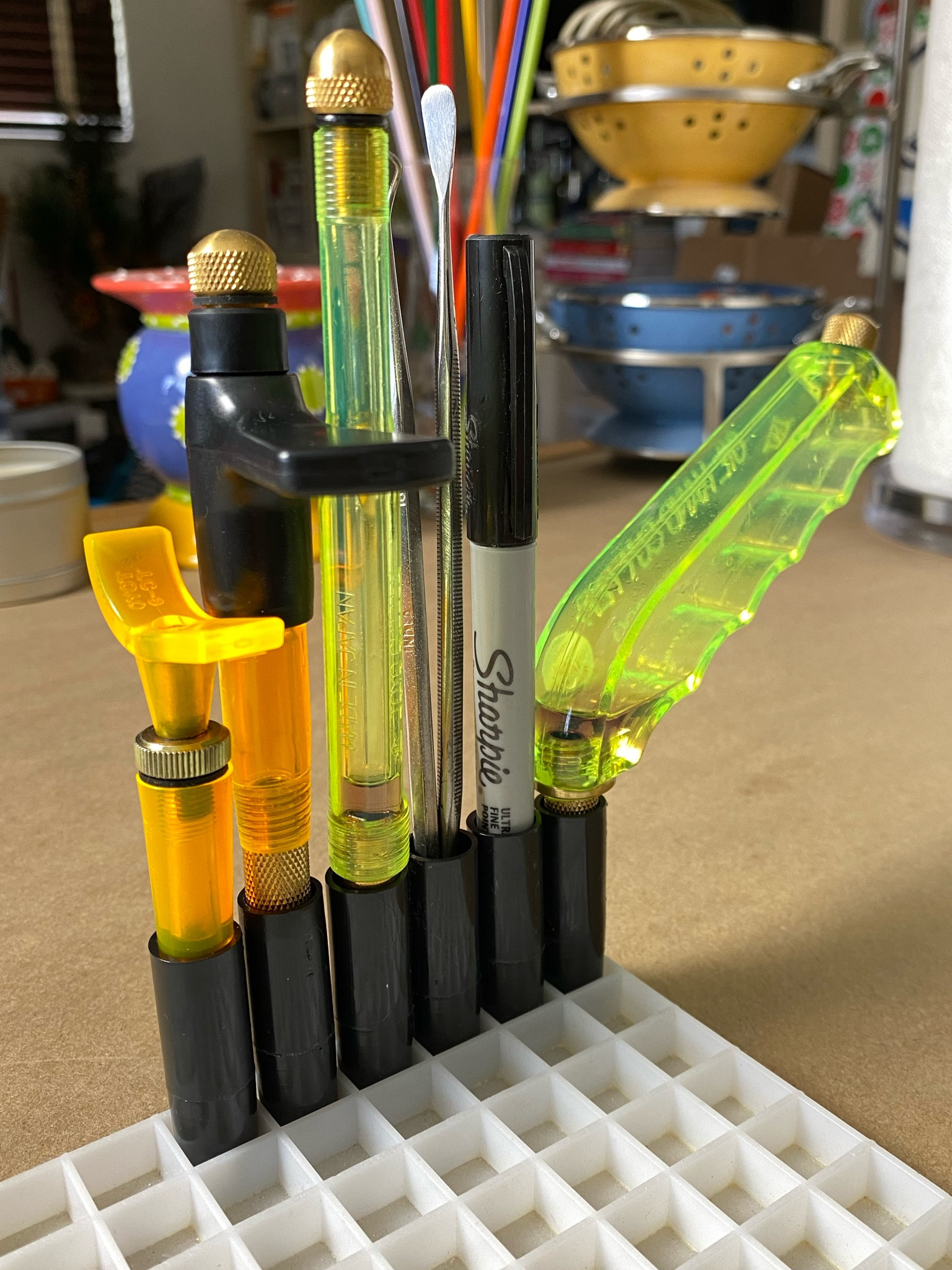 If you’re a mosaic or stained glass artist, and you use a waffle cutting grid, check out this handy accessory.

Now your glass cutters, markers, and metal picks are out of the way until they’re ready to be used.

For mosaic tips, tutorials, inspiration, and so much more please visit my YouTube channel: YouTube.com/julieweilbacher. 

Follow @julieweilbacher on Instagram for all things mosaic art. Gifts for artists - mosaic art - stained glass art - craft room - art studio - glass cutters - crafts organization

#LTKGiftGuide #LTKfindsunder50 #LTKhome