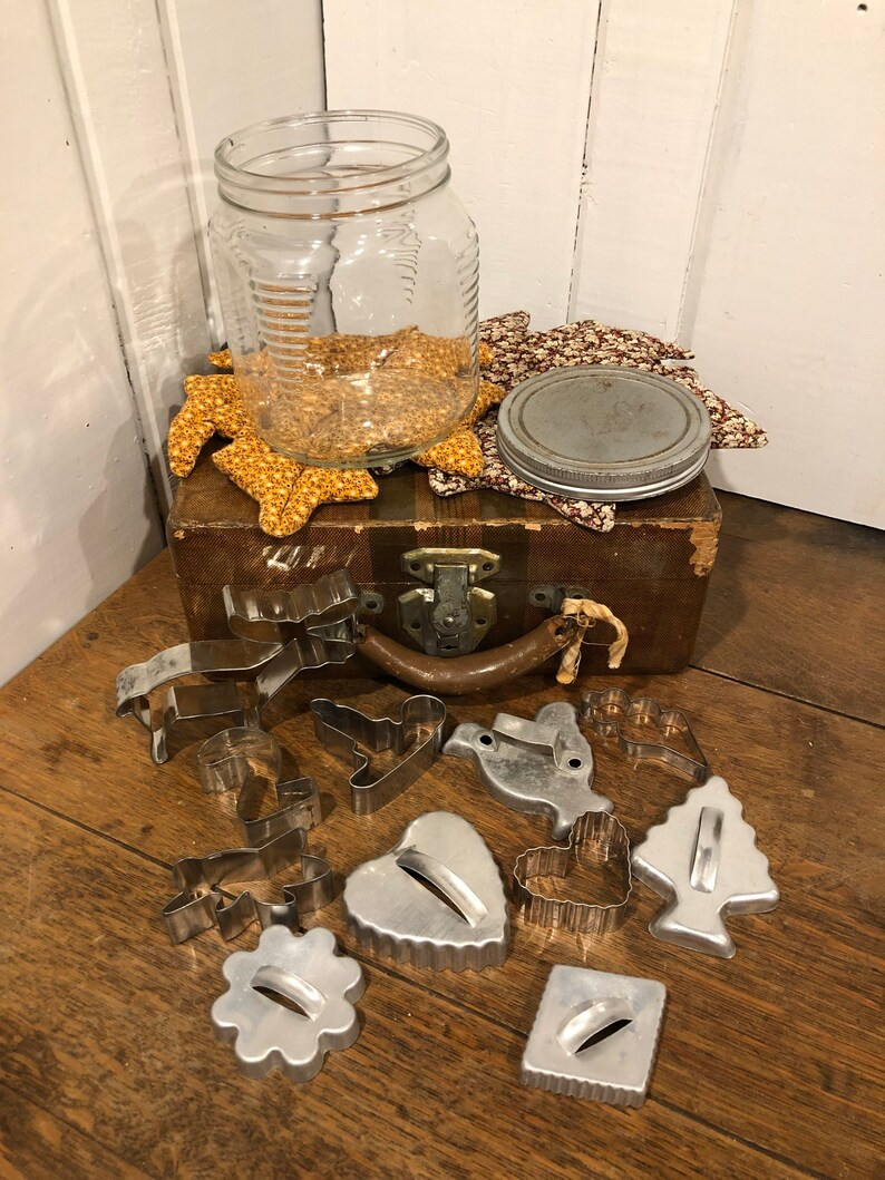 Vintage Glass Jar full of vintage cookie cutters | Etsy (US)