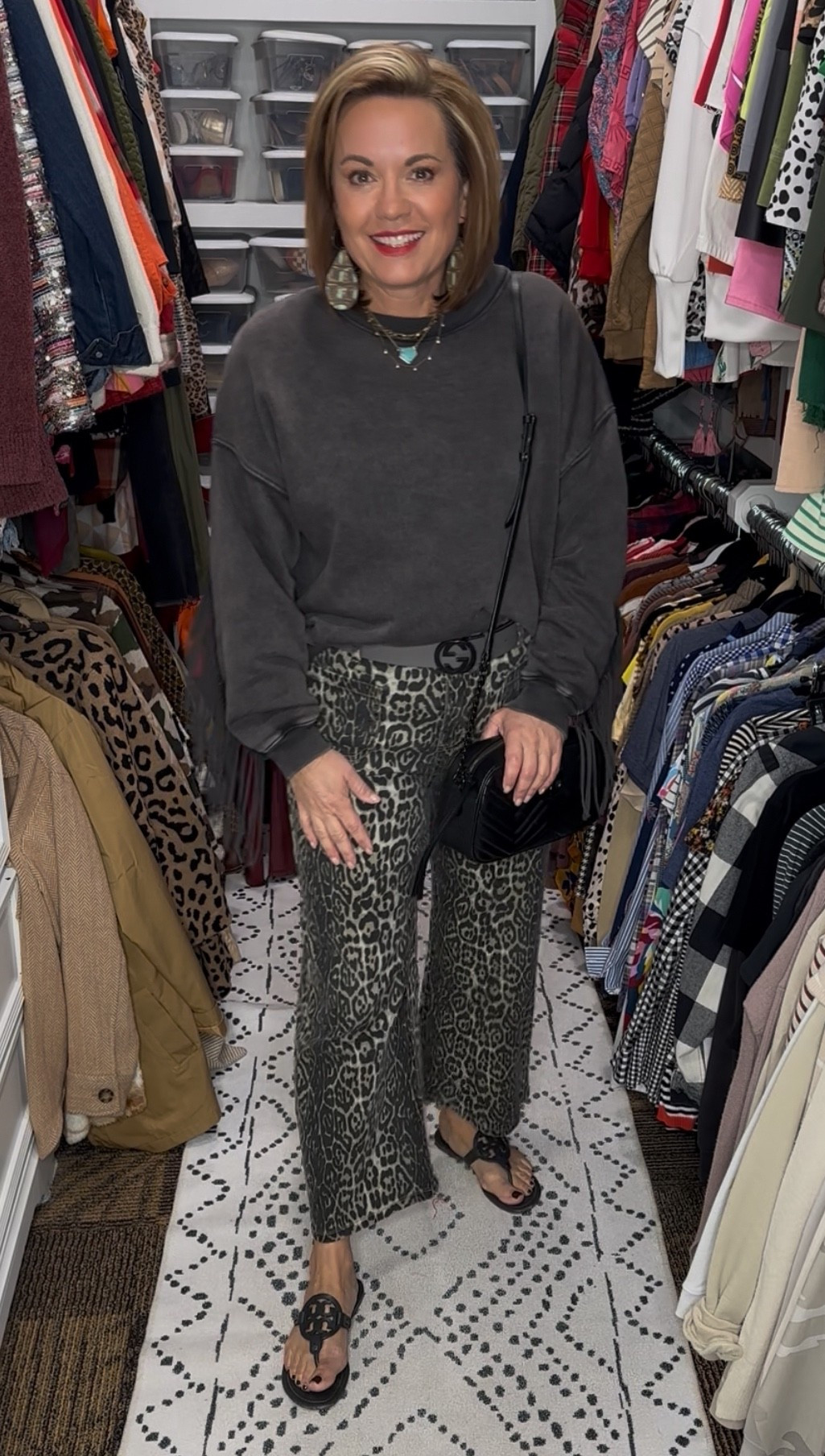 Weekend chic meets effortless comfort 🖤

I love pairing cozy pieces with something bold—this washed charcoal sweatshirt and these leopard wide-leg pants are a match made in comfy-chic heaven! Added my favorite black crossbody and sandals to pull it all together. Perfect for errands, travel days, or casual Fridays.

Shop the look below ⬇️

#ootd #ltkfashion #ltkstyle #ltkwomen #ltkfallfashion #ltktravelstyle

⸻

comfy outfit, casual fall outfit, casual weekend outfit, leopard pants outfit, animal print pants, wide leg pants outfit, black sweatshirt outfit, cozy chic outfit, comfy travel outfit, fall outfit inspo, everyday outfit ideas, fall fashion 2025, mom style outfit, elevated casual outfit, affordable fall outfit, athleisure inspired style, casual chic style, trendy loungewear look, neutral outfit inspo, cozy neutral outfit, minimalist fall fashion, transitional outfit, fall errands outfit, travel day outfit, relaxed style outfit, gucci belt outfit, black accessories, classic black crossbody bag, tory burch sandals, black miller sandals outfit, capsule wardrobe outfit, closet staples outfit, easy fall outfit, effortless chic look, neutral tones outfit, fashion for women over 40, chic comfort style, polished casual look, timeless style outfit, cozy yet chic, elevated basics outfit

#LTKStyleTip #LTKSeasonal #LTKFindsUnder50