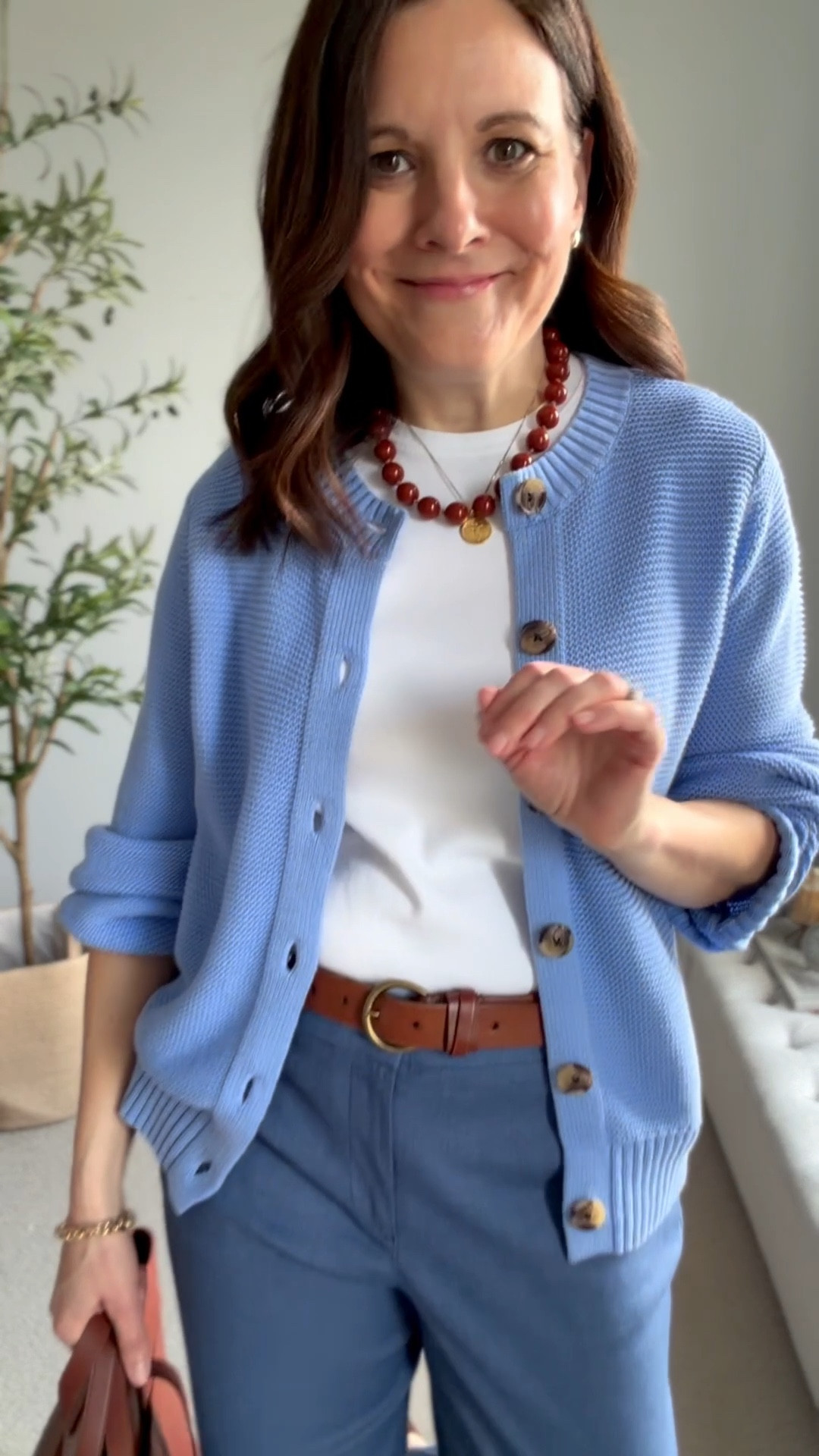 These midrise Riviera pants from LOFT are a reliable go-to for me. I own them in black and also in a fall plaid.
This blue color is a darker light blue. With a 27-inch inseam and a 10-inch rise, they are truly a midrise pant that’s fitted through the hips and thighs with a slim ankle-length leg.
They’re stretchy and so comfortable, with a light smoothing fabric that feels flattering without being stiff.
I own Riviera pants in the curvy fit and always size down one. In the regular fit, I wear my true size. Here I’m wearing the regular fit in my true size 10.
I’m in a medium in this @oldnavy cardigan but could go down to a small. 

#LTKWorkwear #LTKOver40 #LTKMidsize