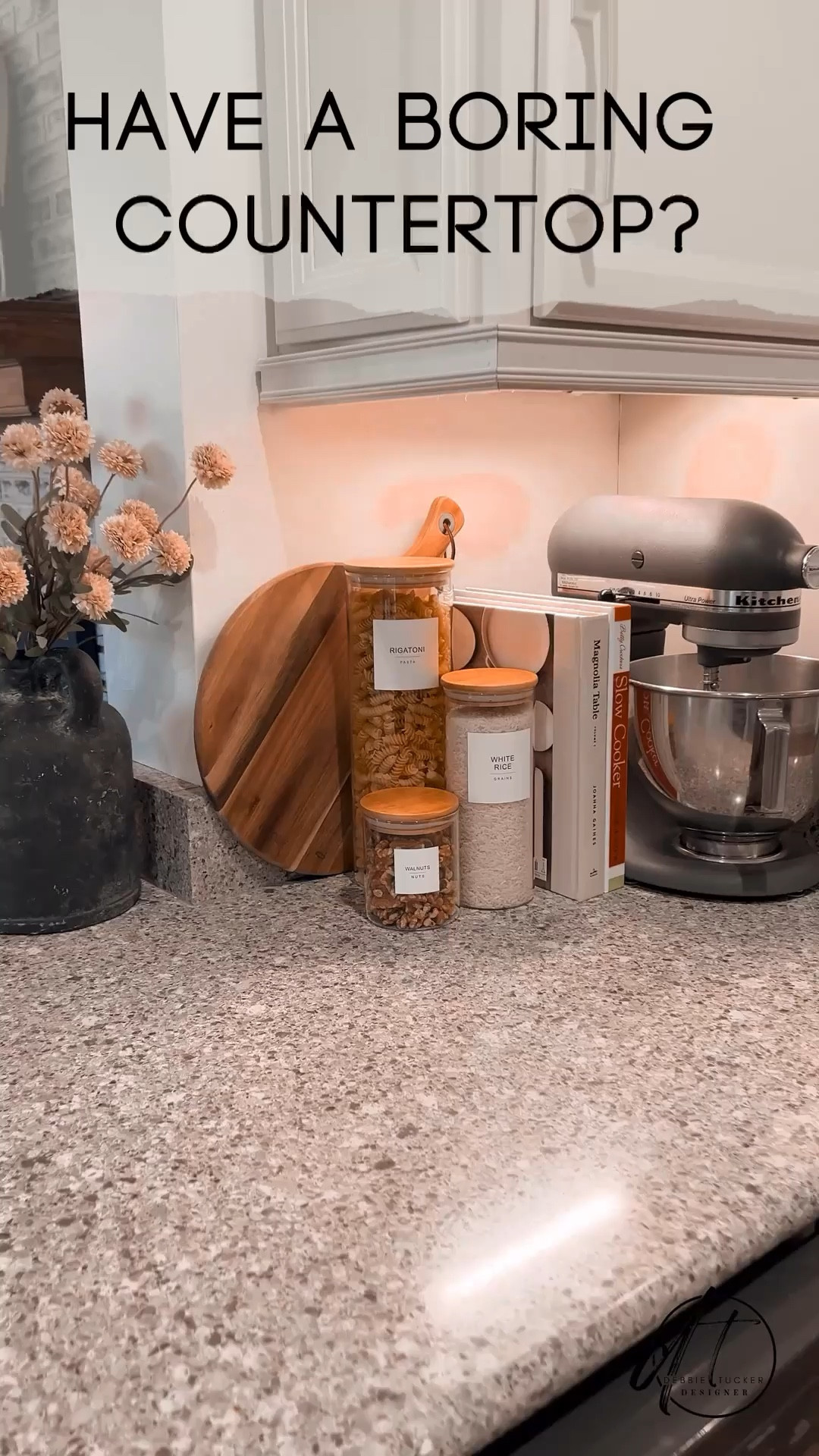 Style your boring kitchen countertop with useful things! Who knew a Kitchen Aid mixer, cookbooks, dry goods, and a cutting board could look so good! Oh and I added a vase of flowers for a little softness  

#LTKfindsunder50 #LTKhome