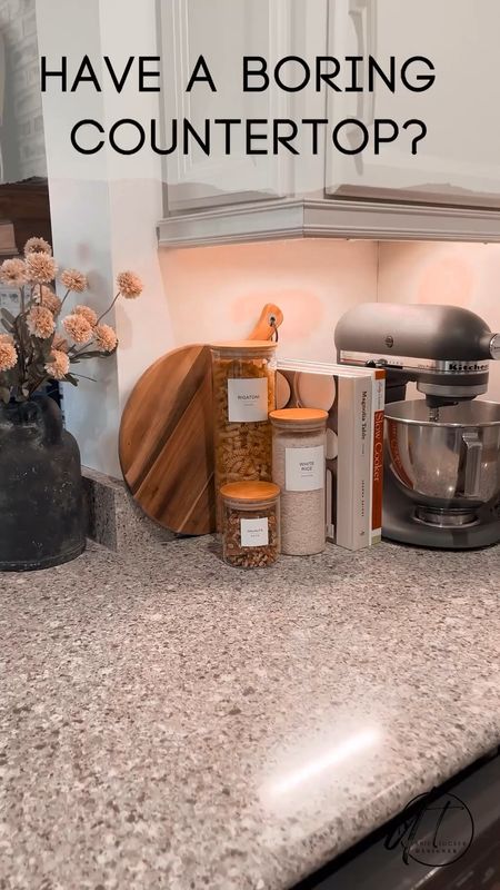 Style your boring kitchen countertop with useful things! Who knew a Kitchen Aid mixer, cookbooks, dry goods, and a cutting board could look so good! Oh and I added a vase of flowers for a little softness  

#LTKfindsunder50 #LTKhome