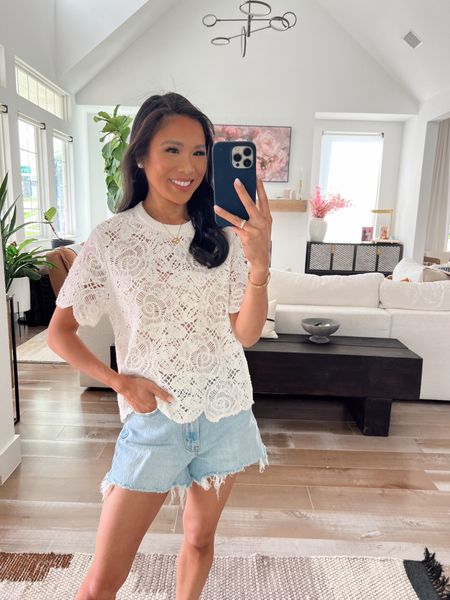 Summer outfit with a crochet top and 90s cutoff shorts. Wearing size XS in the top and 24 in the shorts. Both are on sale for 20% off  

#LTKSaleAlert