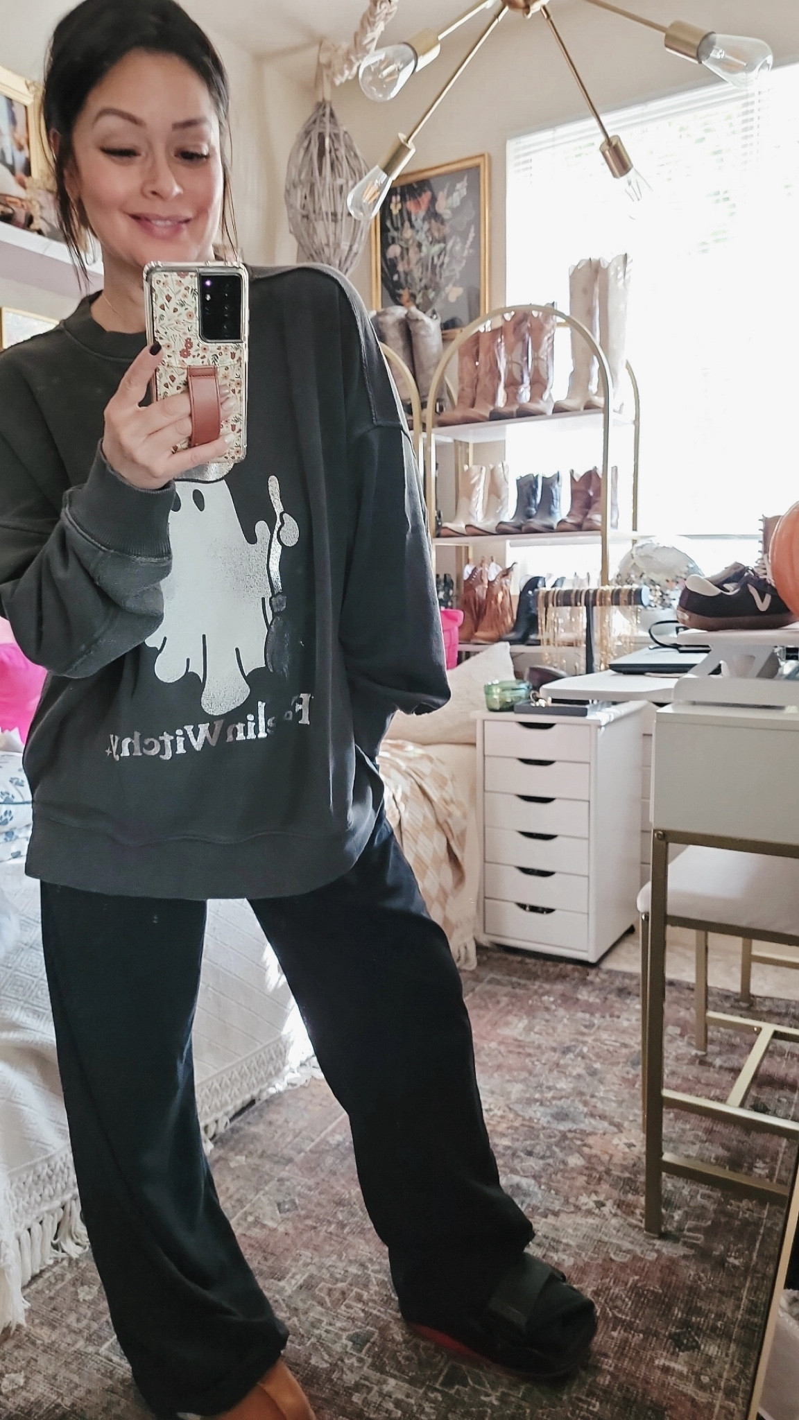Cozy season! Wearing a size large in the sweatshirt & is comfortable. Size 6 in slippers & are super comfortable.
#LTKgift
Slippers 
Halloween sweatshirt 

#LTKStyleTip #LTKShoeCrush #LTKFamily