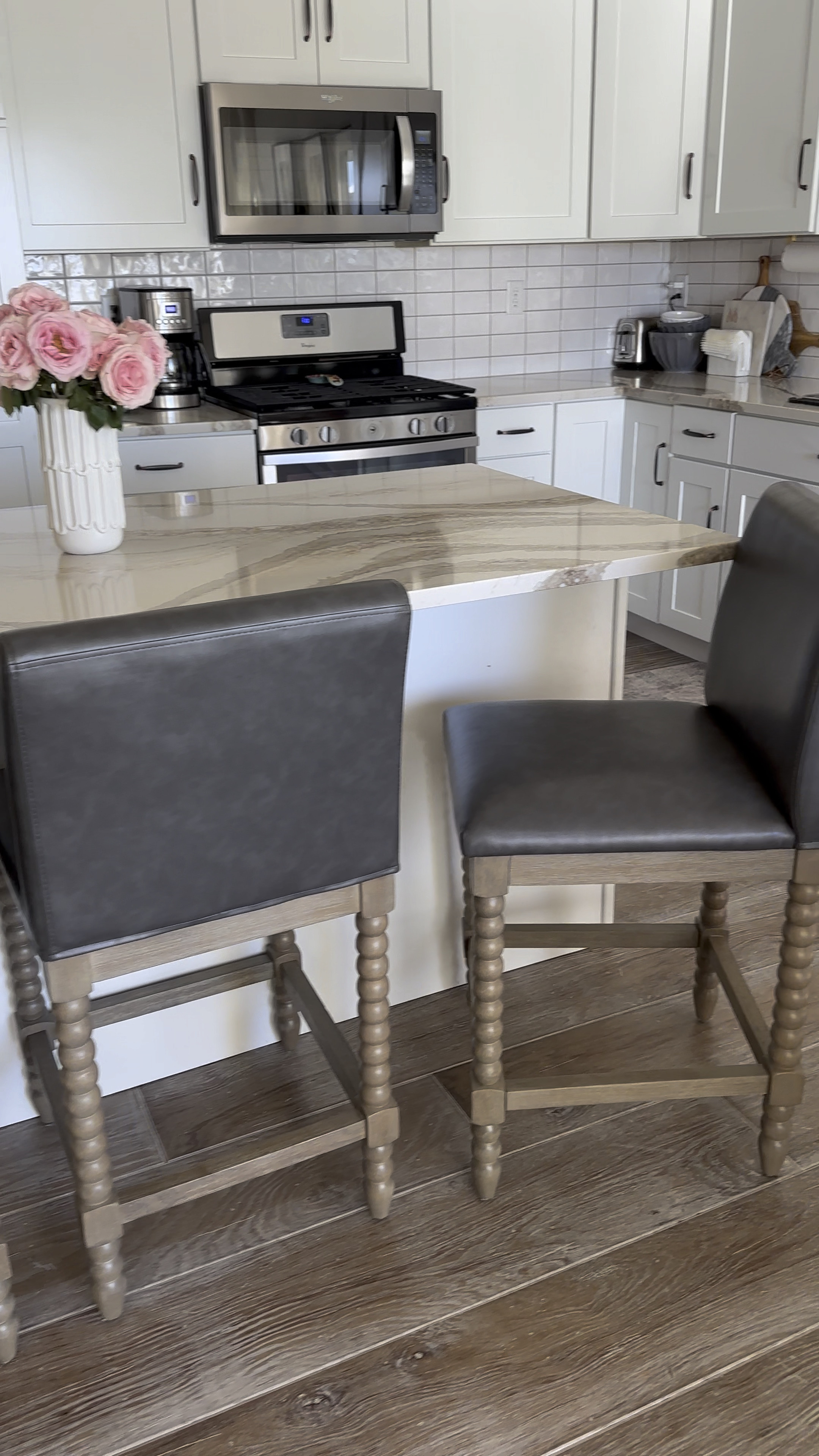 Affordable dupe Leather counter stools under $200 wood and leather with spindle legs. Gray leather and natural wood legs. 60% off clearance Pottery Barn inspired counter stools barstools. Rustic farmhouse organic modern. Dupe dupes more affordable inexpensive option find replica copy cat similar look for less budget friendly affordable cheap cheaper beautiful pretty sale

#LTKMostLoved #LTKhome #LTKsalealert