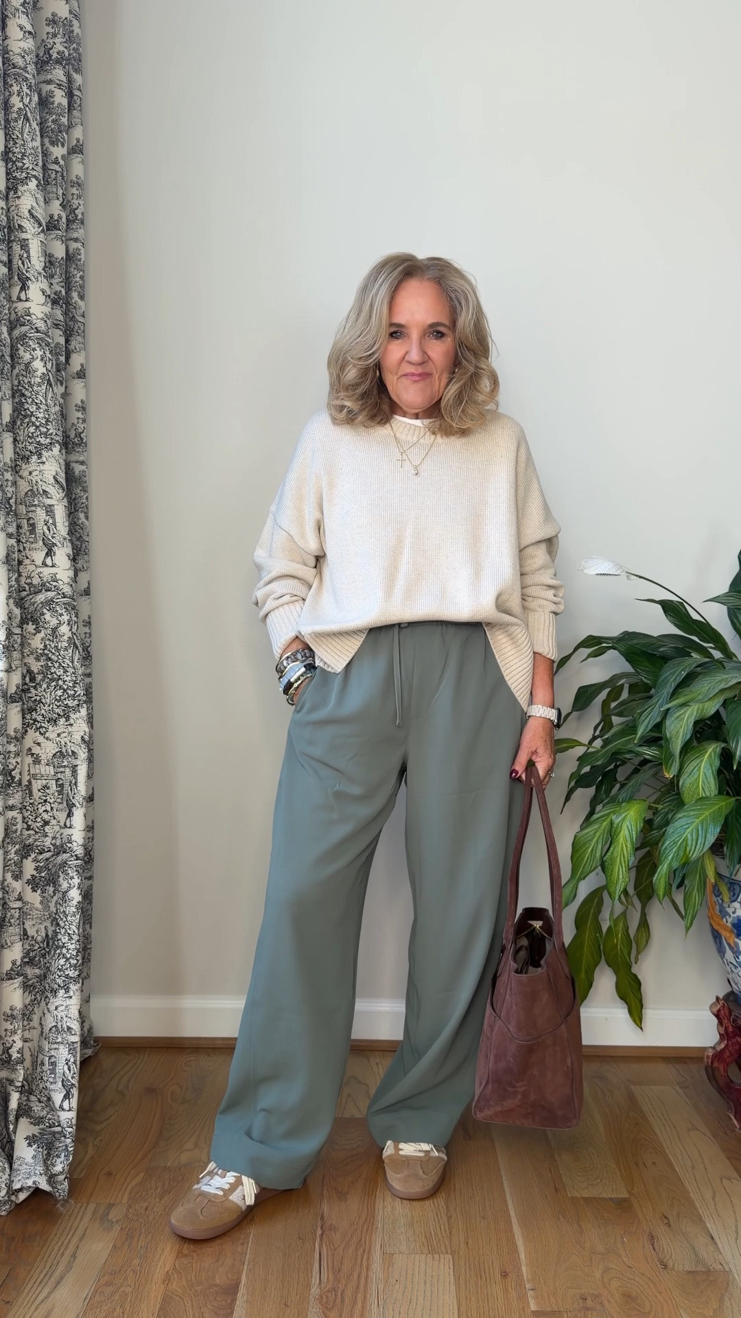 Sweater size medium 
Added a tank underneath and wearing it backwards, so that the neck line is a little bit higher and shows underneath the crewneck
Pants are part of the extra 30% off sale at spanx and I honestly can’t believe it. I hope they don’t discontinue these because they are fantastic. They’re a great option to the viral Aritzia pant not quite as wide and just as good of a performance fabric no wrinkle. I wear a medium regular because the petite hit the top of my shoe.
20% off my bracelet stack using code NANETTE20