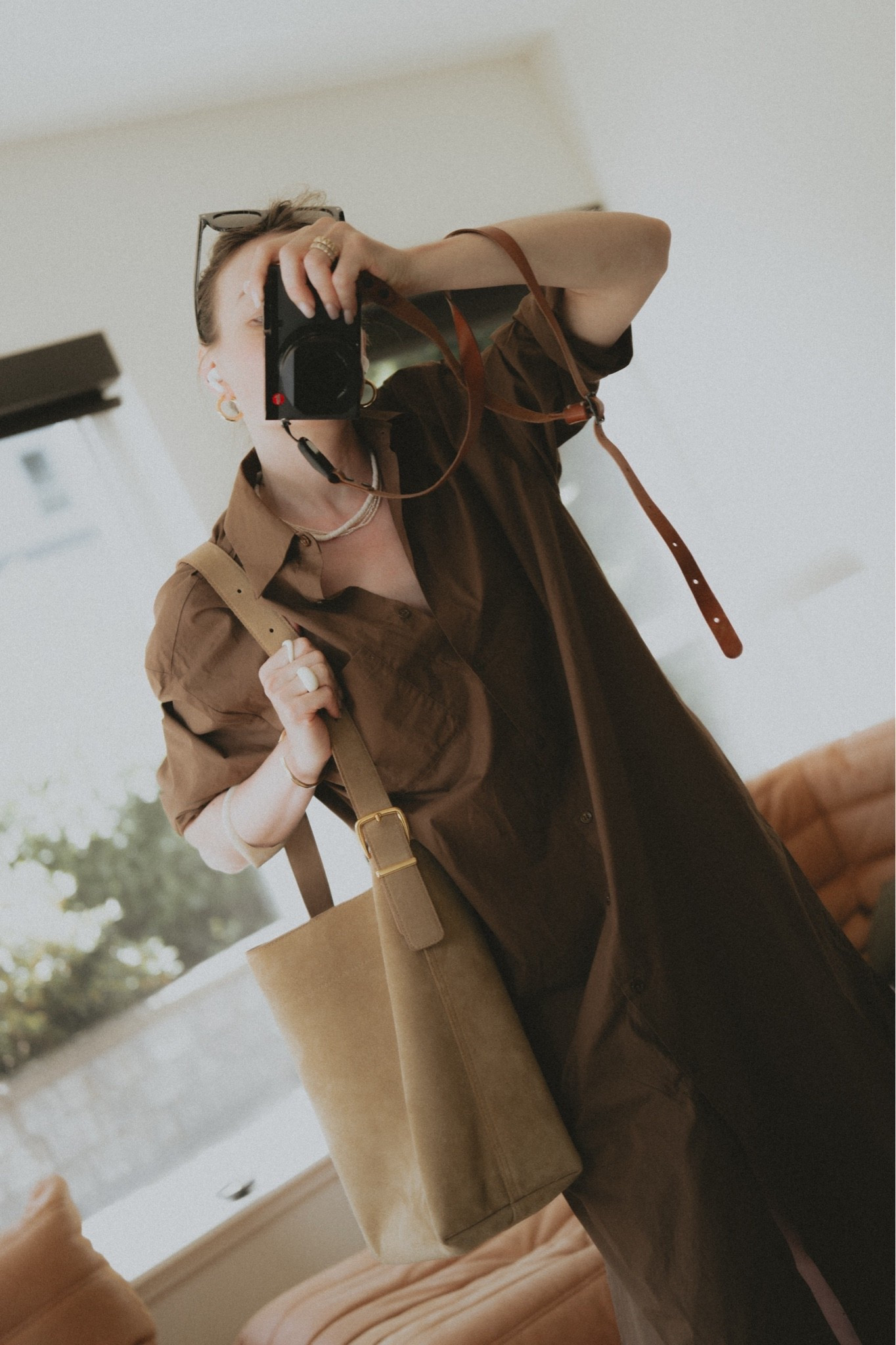 OOTD: a brown shirt dress + suede bucket bag
Dress: The Frankie Shop
Bag: @Madewell The essential bucket tote

#LTKootd #LTKSeasonal #LTKWorkwear