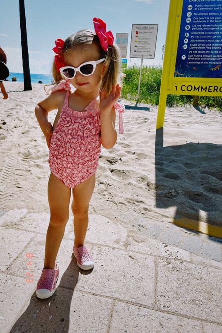 Hey Barbie 🩷 Toddler girl beach summer vaca bubble romper sunsuit retro Janie & jack sunglasses bows native Jefferson pink bling shoes 

#LTKtravel #LTKkids #LTKFind