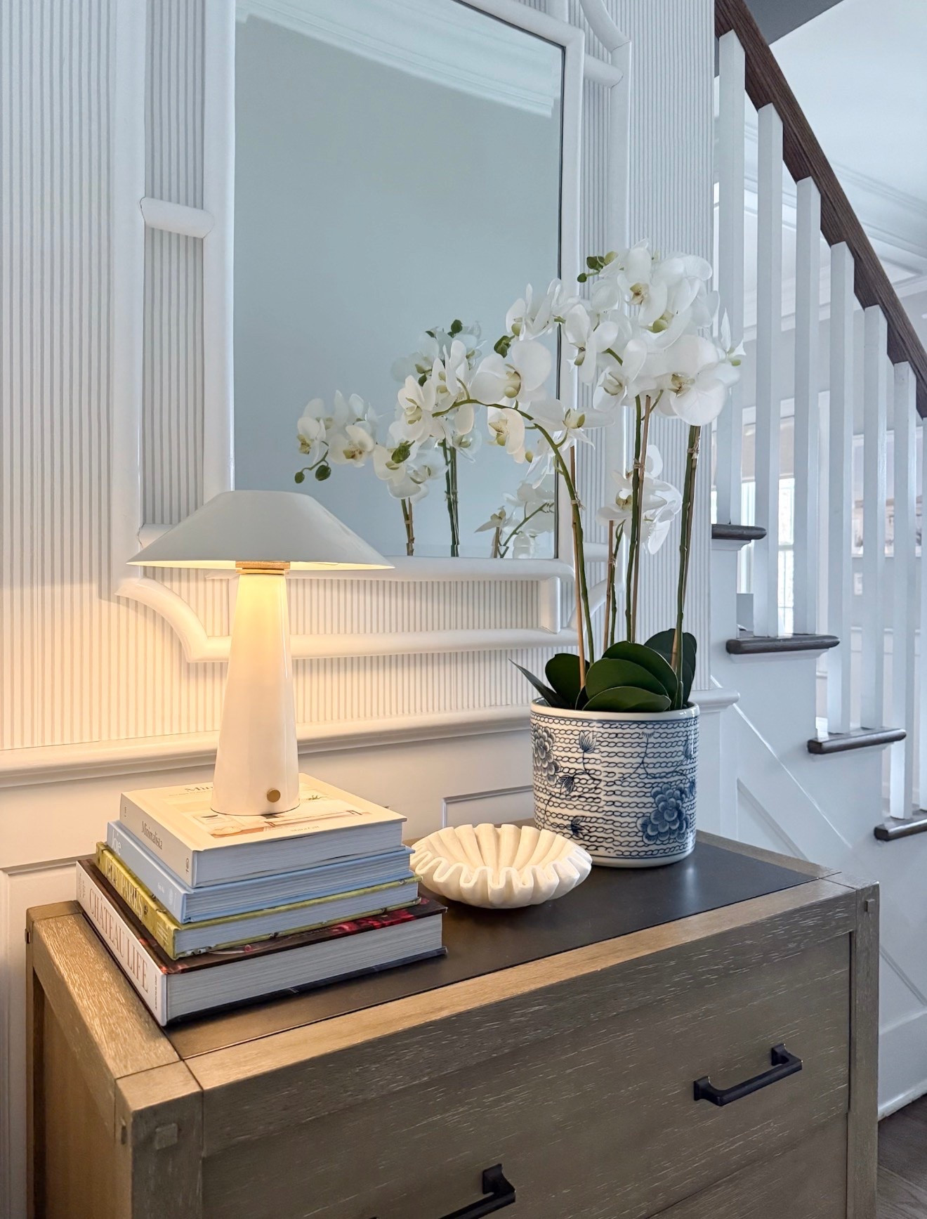 A cozy entryway moment … 

LOVE this cordless lamp (it literally looks great everywhere and comes in a bunch of colors - I also have one on my bedside table!), my mirror has been a favorite for years and this marble ruffle dish and vase are too pretty not to share!

#LTKSaleAlert #LTKHome #LTKSeasonal