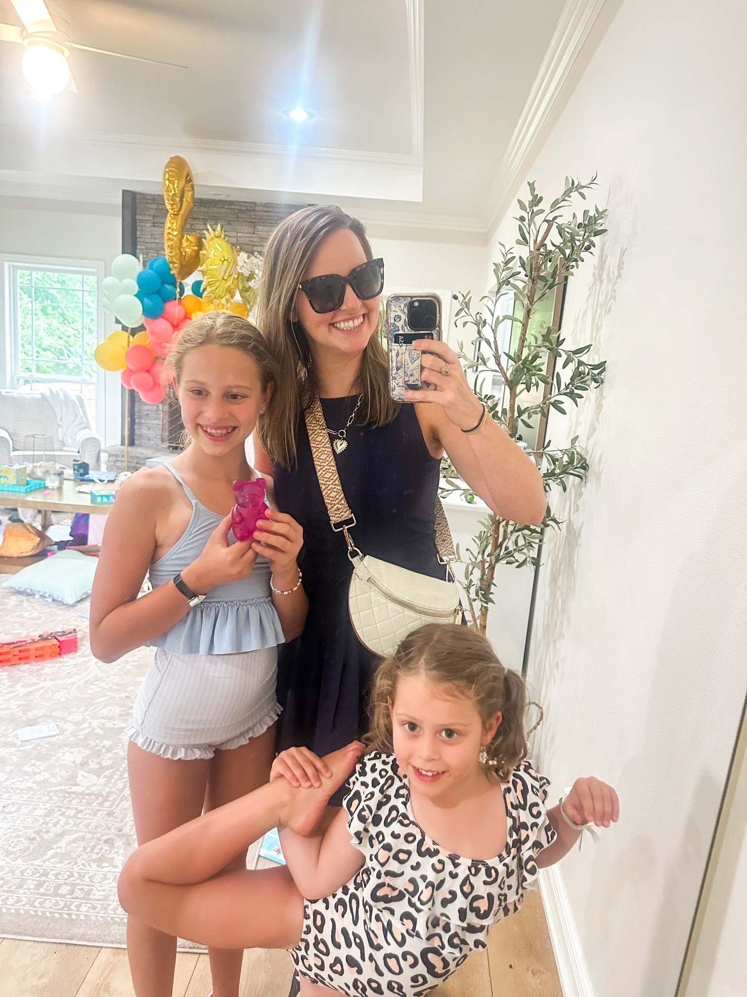 Summer mode on!!! ☀️ Loving this athletic active dress with built in biker shorts. Makes it Easy to get dressed on the hot summer days. The girls swimsuits are from @infamousswim and @kortnijeane

#LTKmomlife #LTKTravel #LTKSwim