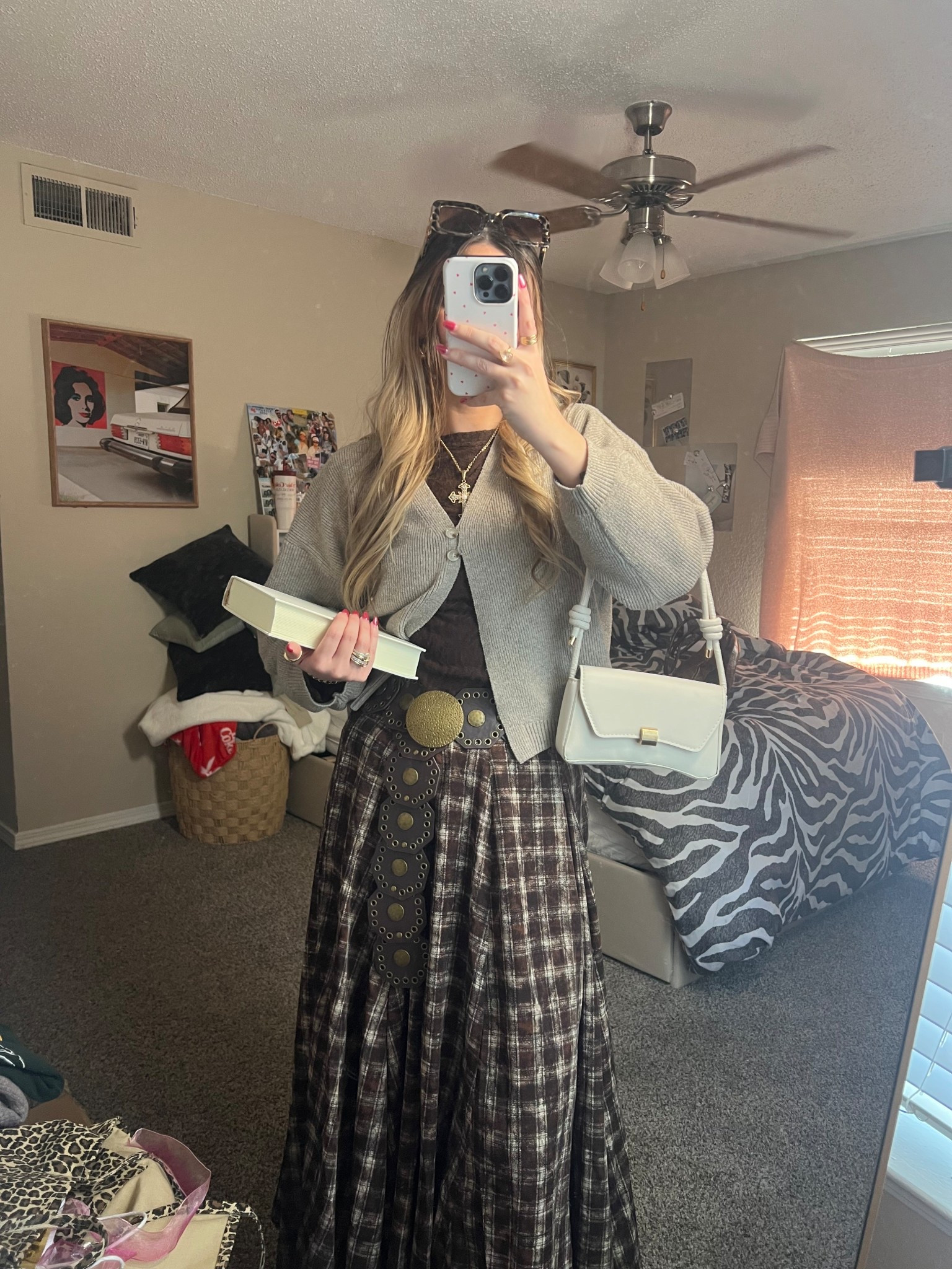 Cozy layers + vintage vibes 🤎🍂 This neutral fall outfit is giving effortless, lived-in style. I’m wearing a soft oatmeal cardigan layered over a brown fitted top, paired with a vintage-inspired plaid maxi skirt and a statement concho belt for that perfect boho touch. Finished with chunky jewelry, a shoulder bag, and easy everyday layers—this look is perfect for fall errands, coffee dates, bookstore days, or casual weekends. Comfortable, classic, and so easy to style 🤍
Keywords: fall outfit, neutral outfit, cozy fall look, cardigan outfit, oversized cardigan, plaid skirt outfit, maxi skirt outfit, vintage inspired outfit, boho outfit, boho fall style, casual fall outfit, layered fall look, neutral tones, earth tone outfit, capsule wardrobe, everyday outfit, comfy chic, autumn fashion, LTK fall finds, LTK outfit, fall layering, cozy aesthetic

#LTKootd #LTKSaleAlert #LTKgrwm