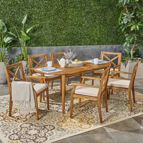 Jim 6 - Person Oval Outdoor Dining Set with Cushions | Wayfair North America